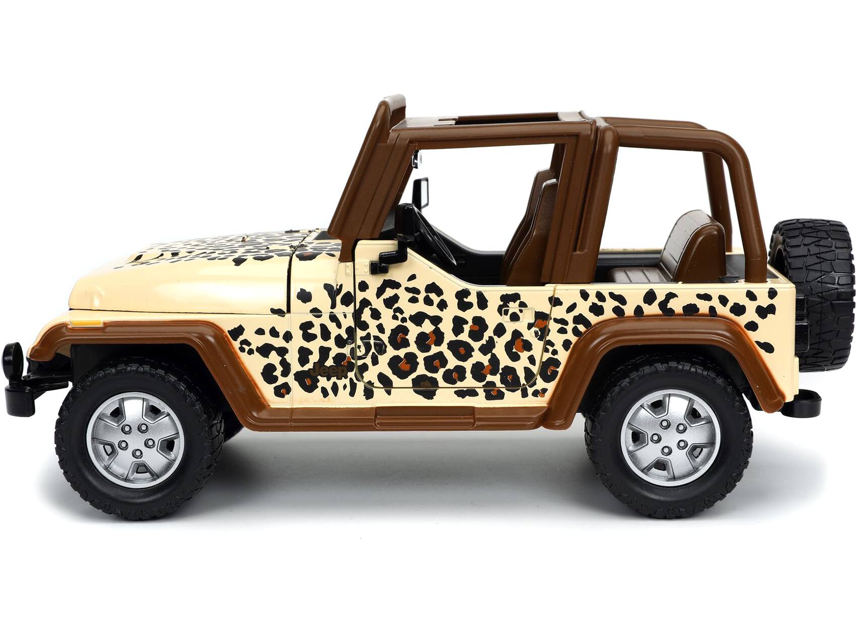 Alt View 1. Jada - 1992 Jeep Wrangler Tan and Brown with Graphics and Extra Wheels "Just Trucks" Series 1/24 Diecast Model Car by Jada.