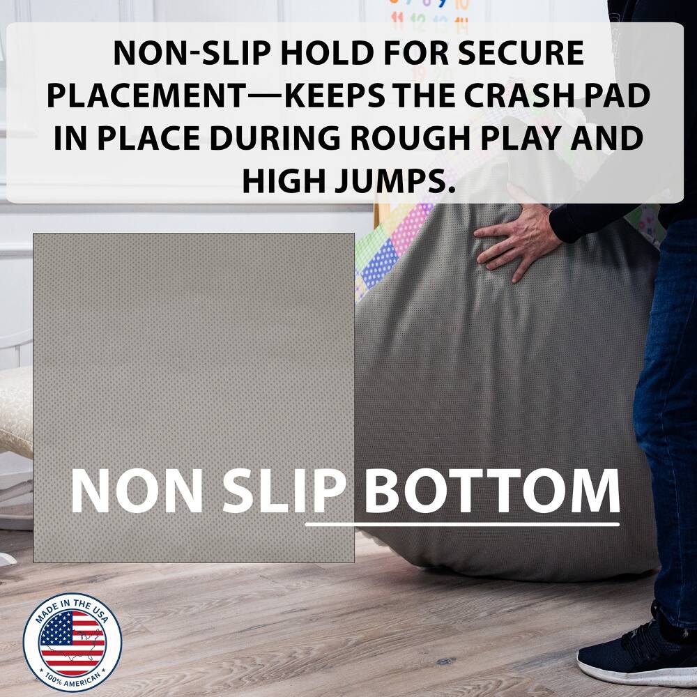 IV 11 14 NON-SLIP HOLD FOR SECURE PLACEMENT—KEEP THE CRASH PAD IN PLACE DURING ROUGH PLAY AND HIGH JUMPS.  
NON SLIP BOTTOM  
MADE IN THE USA  
100% AMERICAN