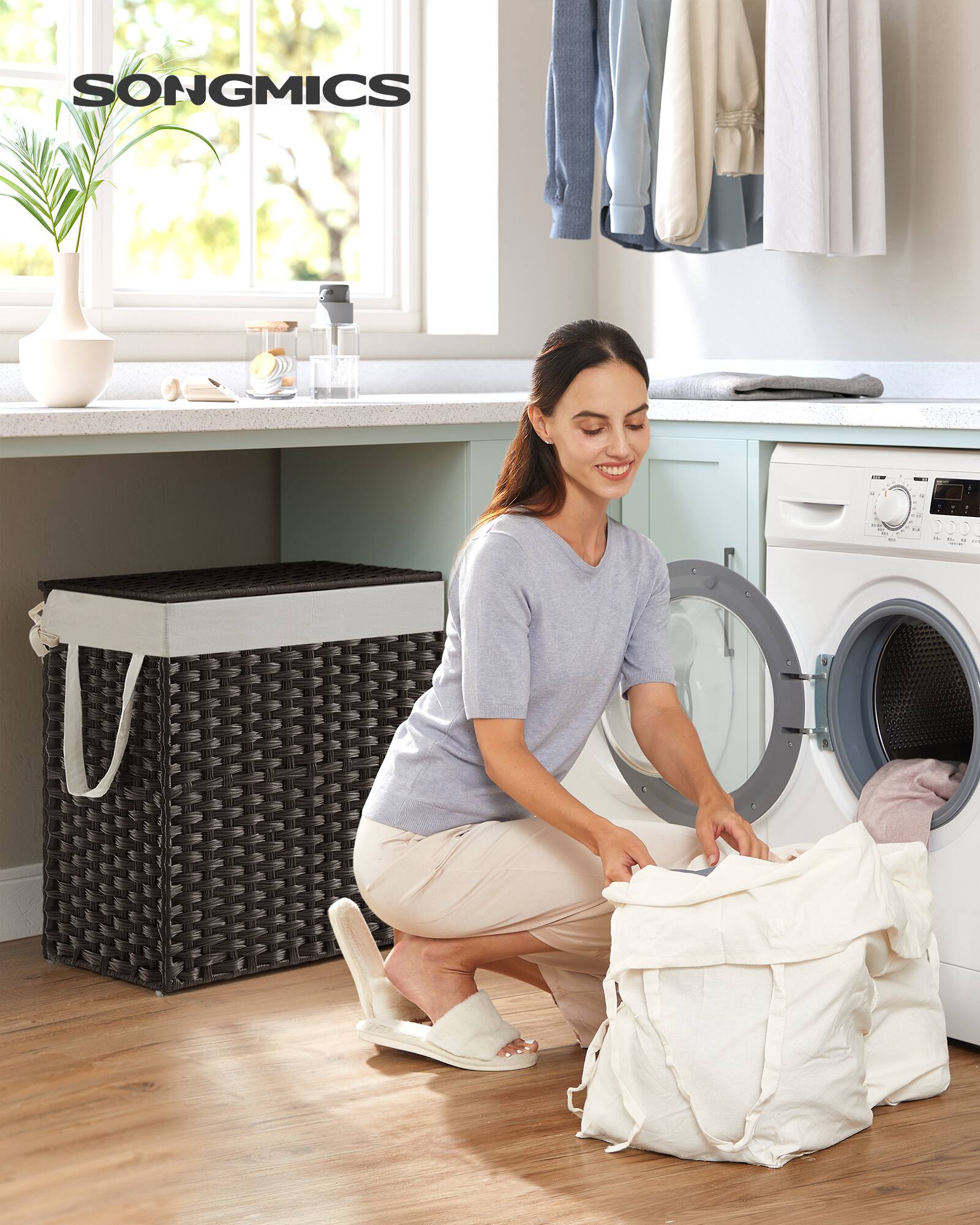 Angle. Songmics Home - Laundry Hamper with Lid and 2 Removable Liner Bags,110L, 6 Mesh Bags, Wicker Laundry Basket, Double Laundry Hamper - Black.