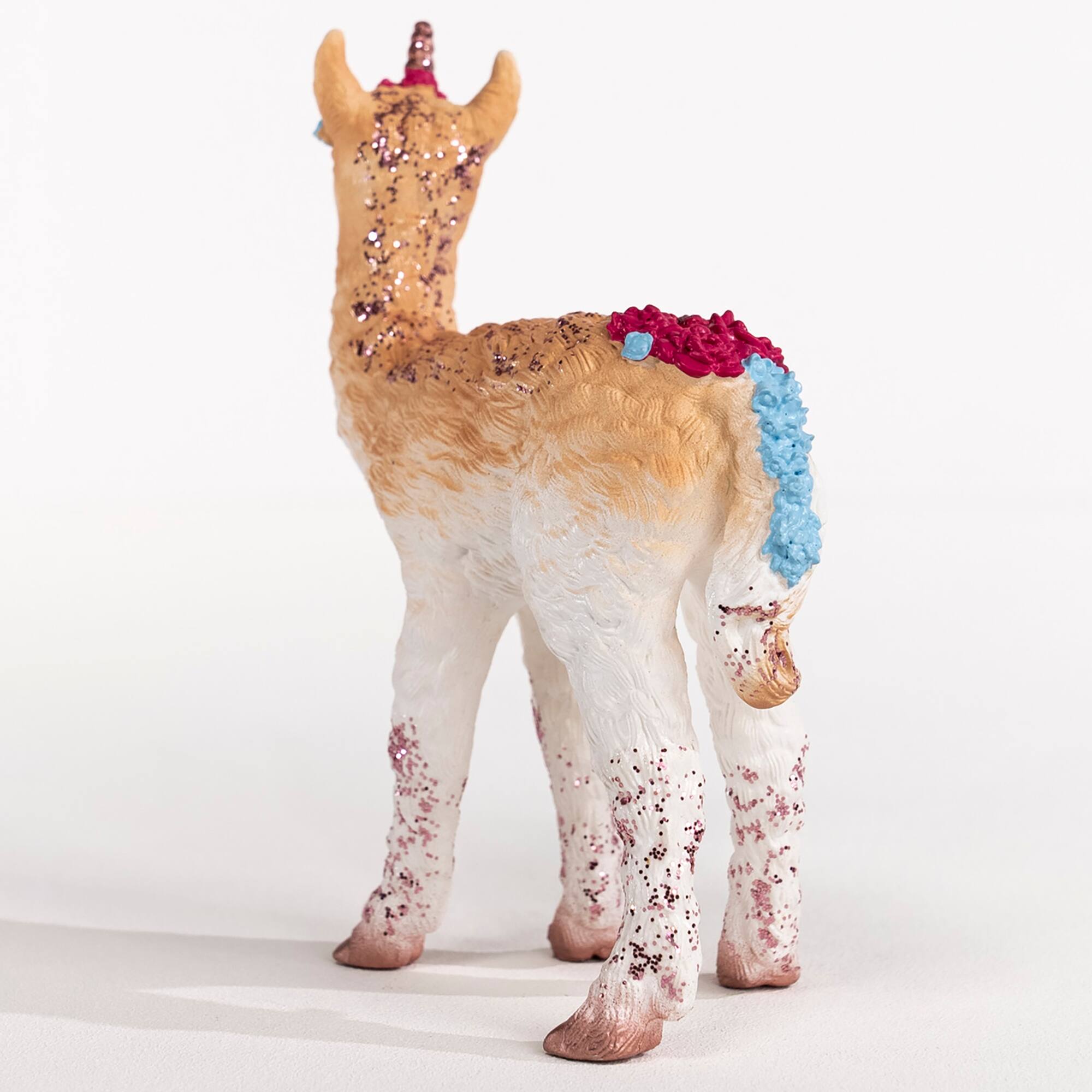 Left. Schleich - Bayala: Llamacorn.