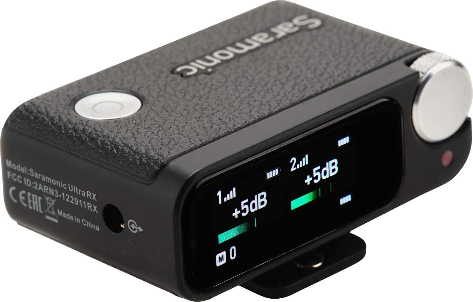 The image features a black electronic device with the text "Saramonic Model: FCC Saramonic C ID:2ARN3-122911RX Ultra RX EERE Made in China 2,1l +5dB 1.ll +5dB" displayed on it. The device is likely a compact electronic device or a small camera, as it is described as a "little camera."