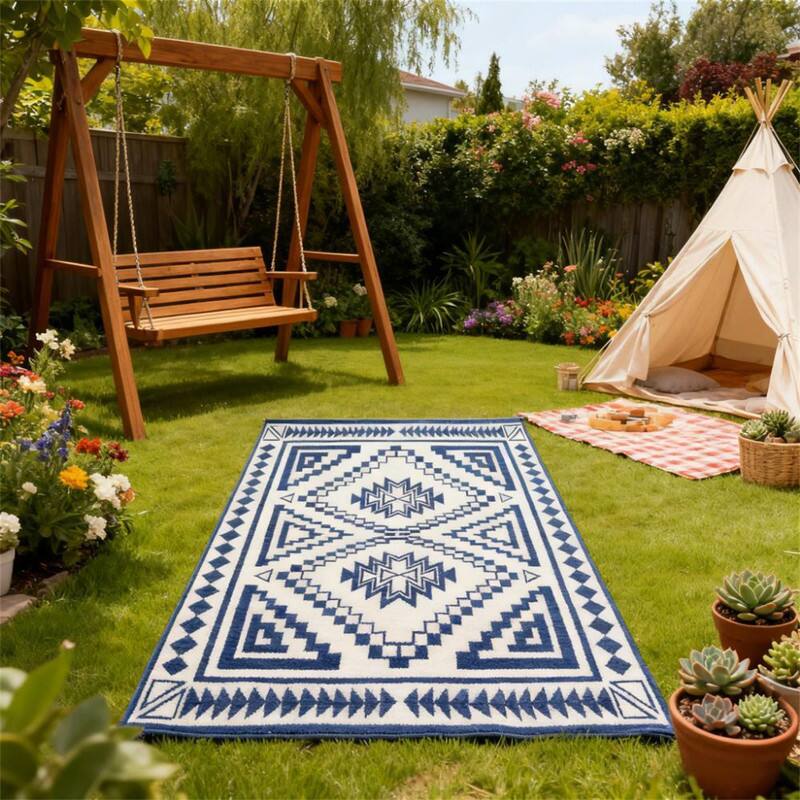 Alt View 2. HTUTWOO - 9' x 18' Outdoor Reversible Rug - Waterproof Plastic Straw Patio Mat with Carry Bag, Foldable Camping Carpet - Blue White.