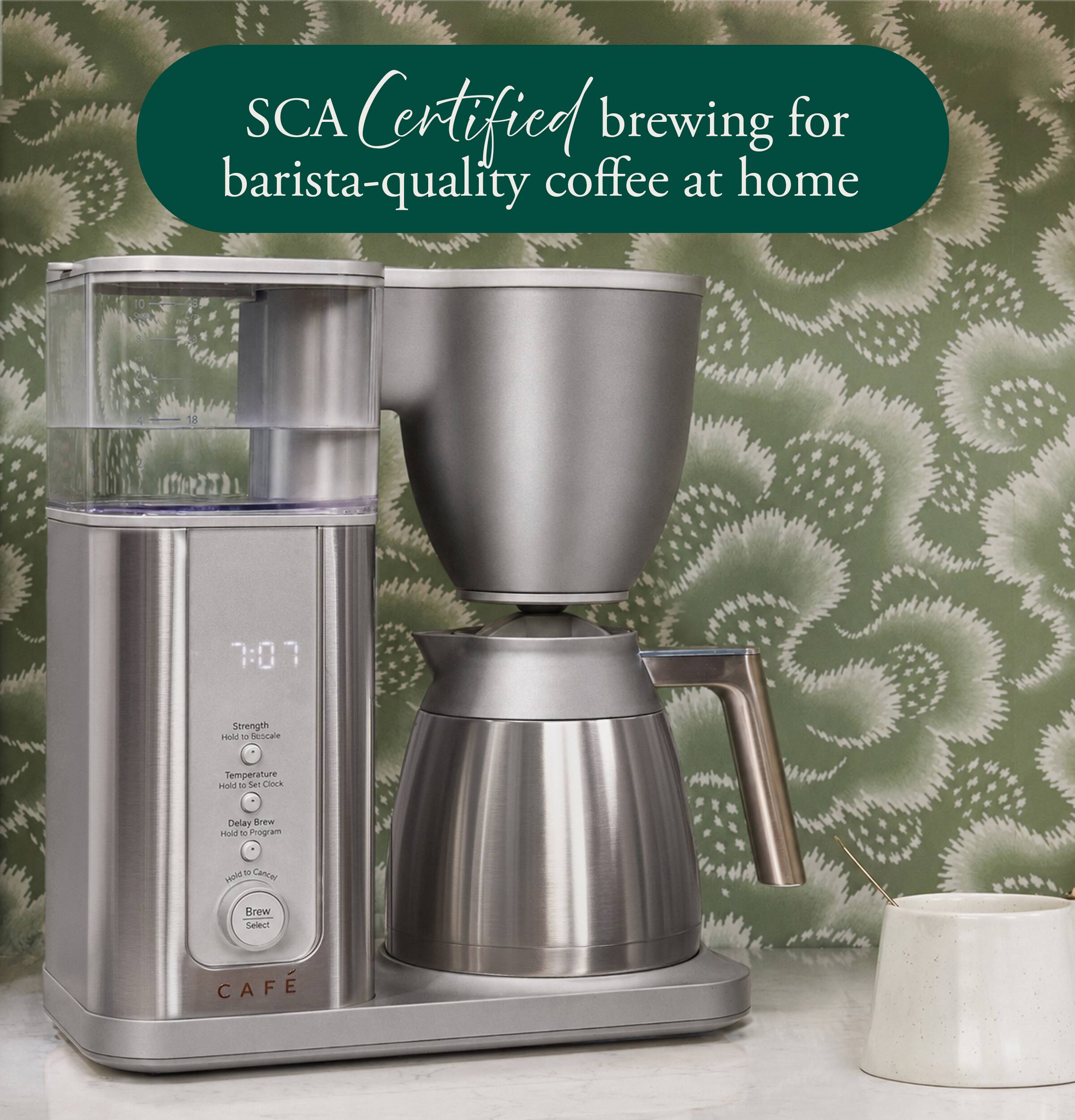 SCA Certified brewing for barista-quality coffee at home

10
18
7:07
Strength Hold 10 Scale
Temperature Hold O Set Clock
Delay Brew Hold 10 Program
9 Cancel HOW
Brew Select
CAFE
