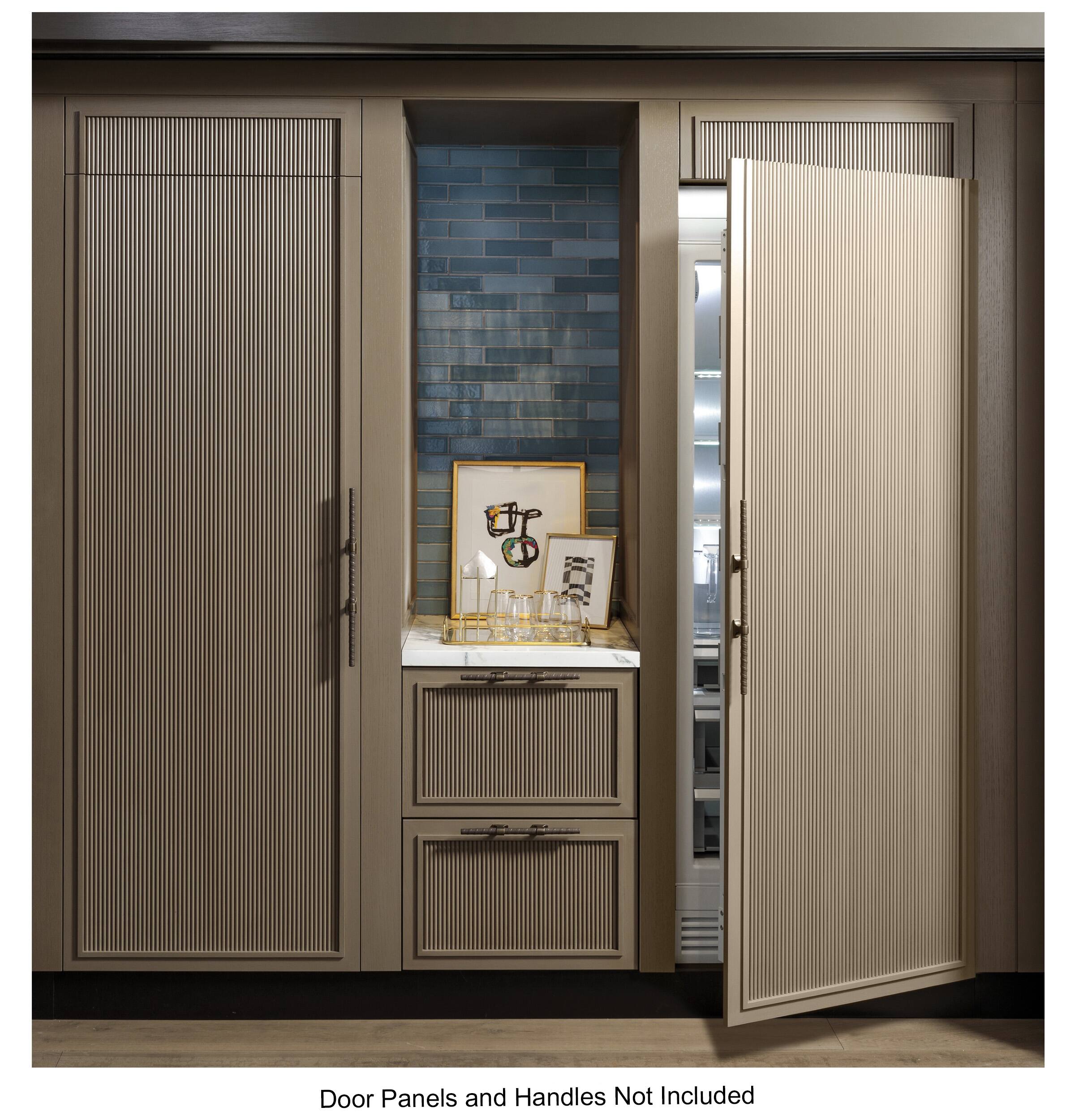 The image shows a kitchen with a wooden cabinet that has a mirrored door. The cabinet has a built-in sink and a picture frame on top of it. The door is open, revealing the sink and the picture frame. The text on the image indicates that the door panels and handles are not included, which means that the buyer will need to purchase these separately.