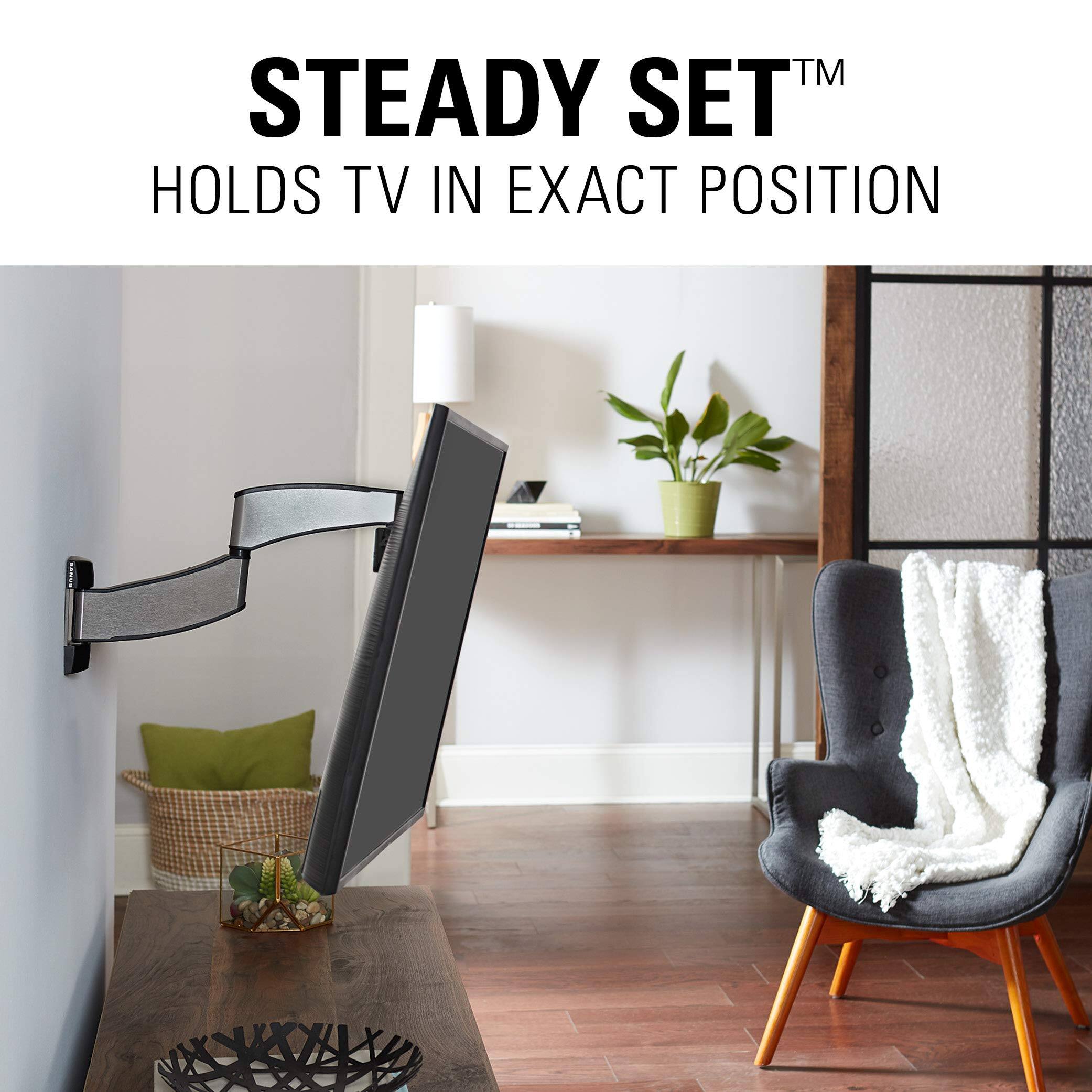 The text on the image reads: "STEADY SET™ HOLDS TV IN EXACT POSITION."