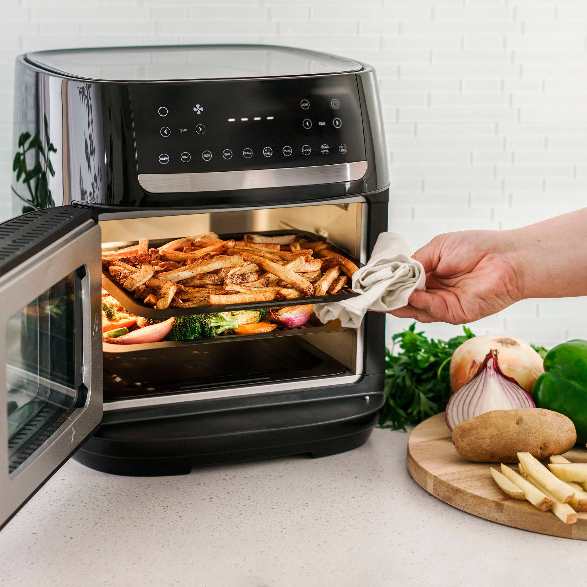 Left. bella PRO - 12.6-qt. Touchscreen Air Fryer Pizza Oven with Rotisserie - Stainless Steel.