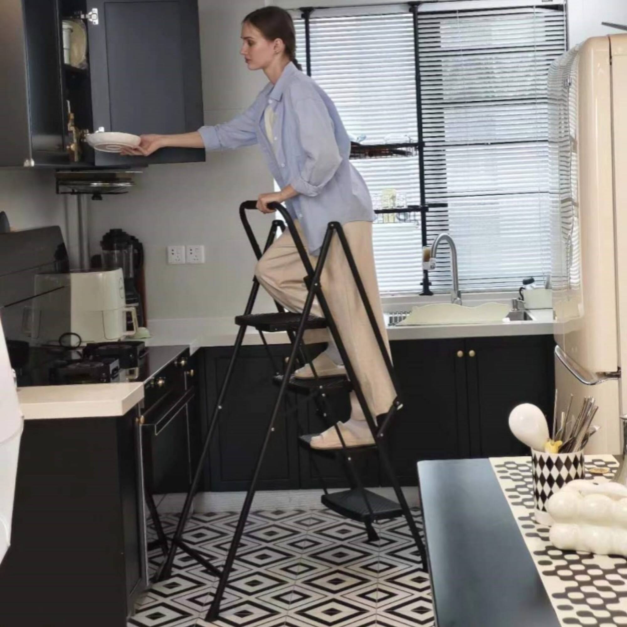 Left. ELEMENT ACE - Lightweight Folding Four-Step Stool with Anti-Slip Pedal and Safety Handle for Office Use - Black.