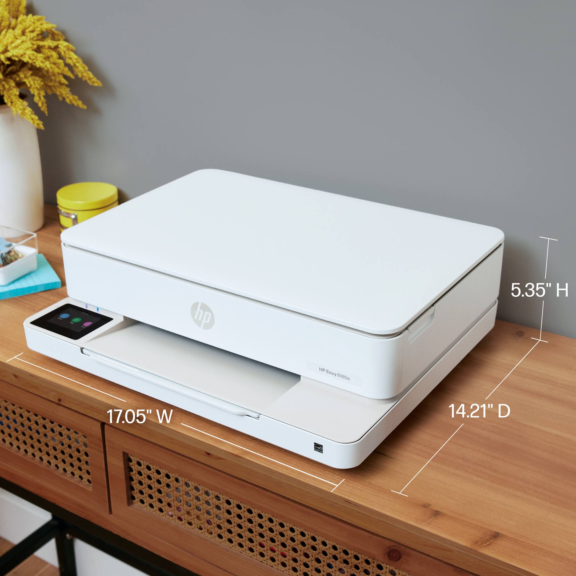 HP Envy 8655e

Dimensions:
- Height: 5.35"
- Width: 17.05"
- Depth: 14.21"