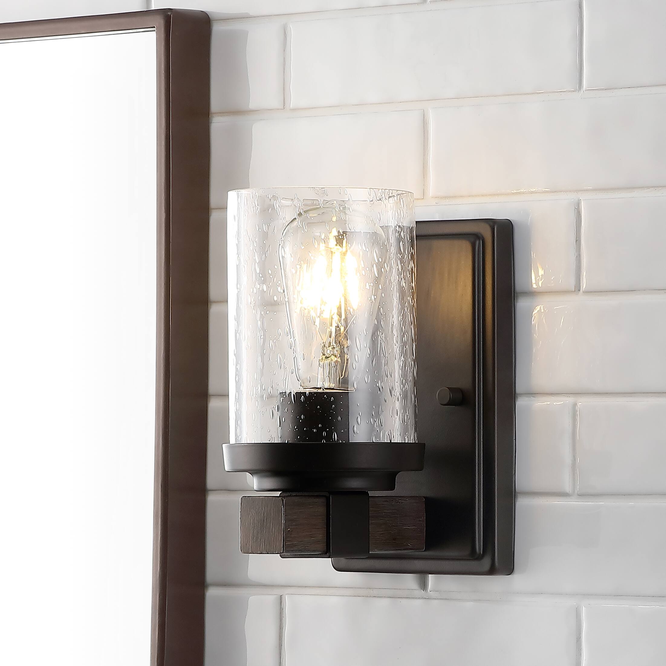 Alt View 1. Jonathan Y - Bungalow 4.5" 1-Light Iron/Seeded Glass Rustic Farmhouse LED Vanity Light, Oil Rubbed Bronze - Oil Rubbed Bronze.