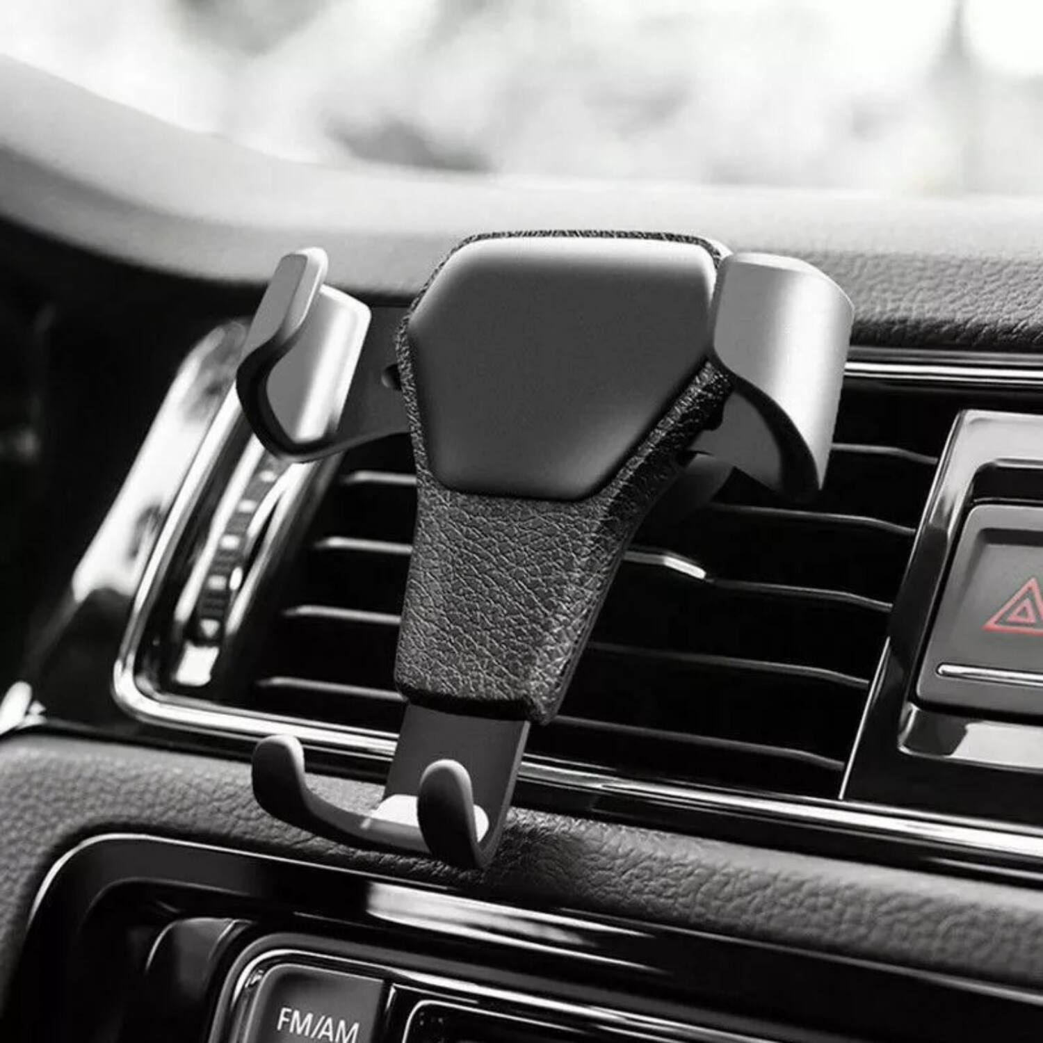 Angle. Stock Preferred - Gravity Car Mount Air Vent Phone Holder - Black.