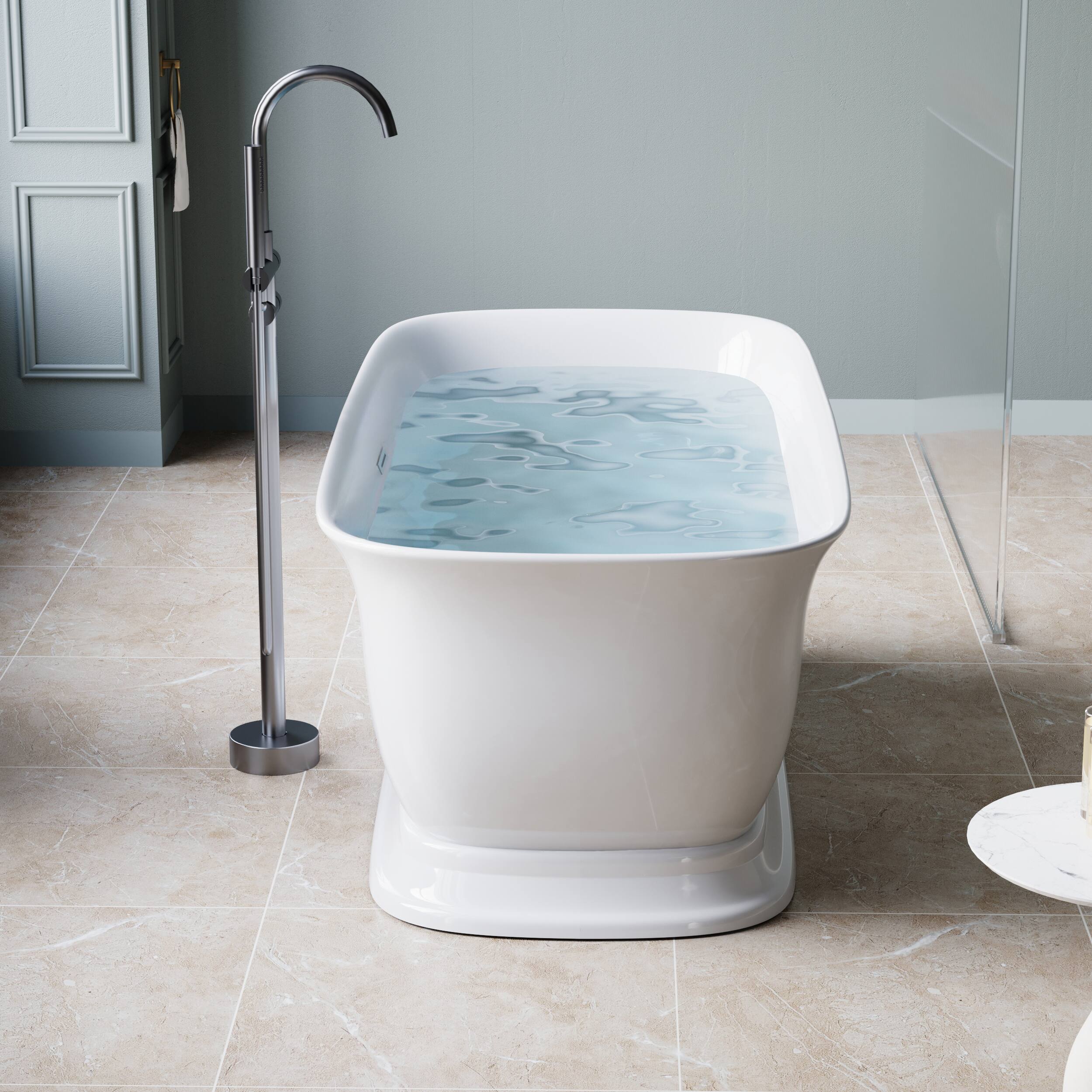 Left. WELLFOR - Tivor 67 in. x 31.5 in. Acrylic Freestanding Soaking Bathtub with Center Drain and Overflow - White.