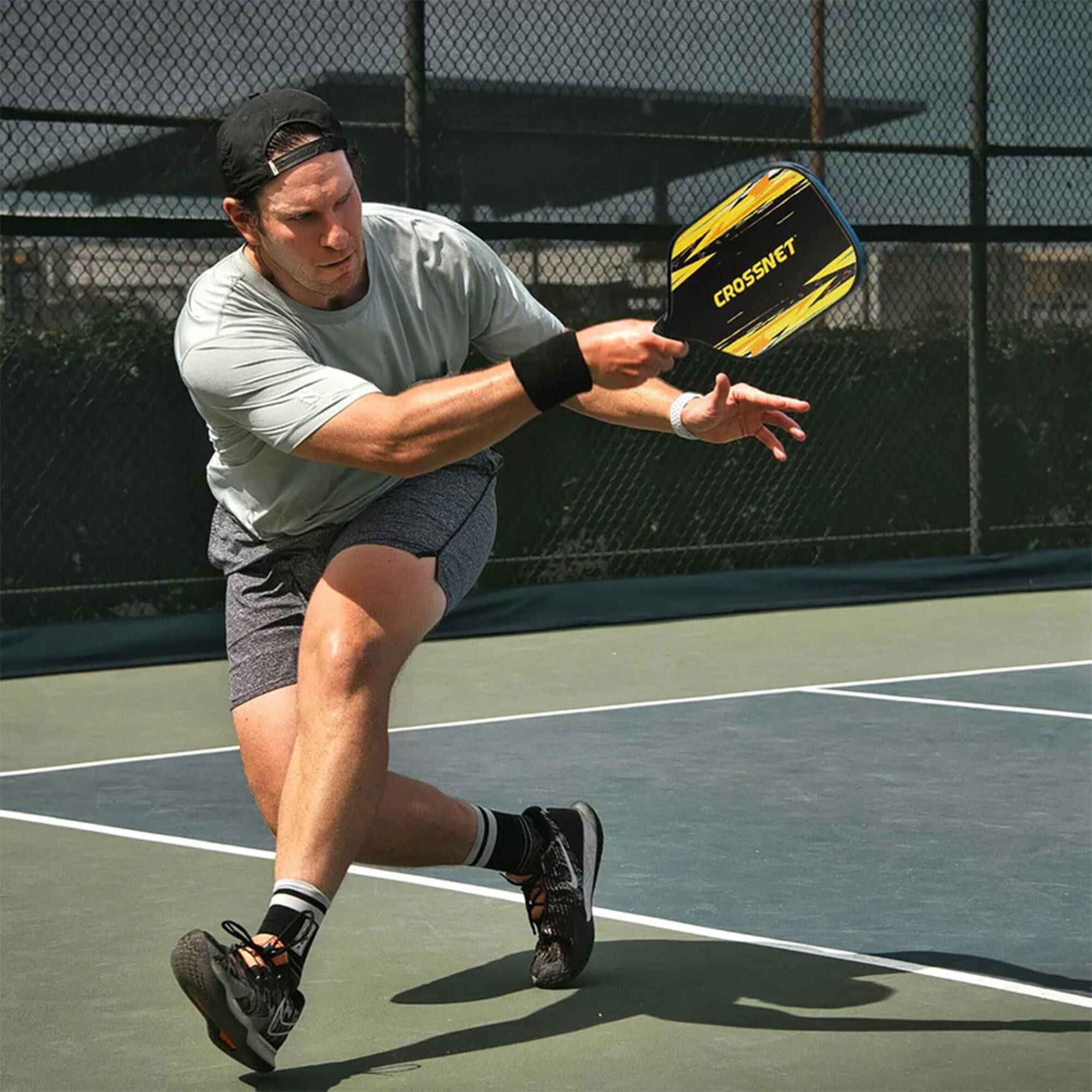 Alt View 10. CROSSNET - CROSSNET Pickleball Paddle with Fiberglass Face & Polymer Core, Cosmic Splatter - Black and Yellow.