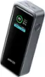 The image features a black and silver Anker device with a screen displaying the remaining battery life at 85%. The device is designed to charge other devices, such as smartphones or tablets. The screen also shows the charging current, which is 30.0w, and the voltage, which is 45.0w. The Anker device is a portable and convenient solution for charging on-the-go.