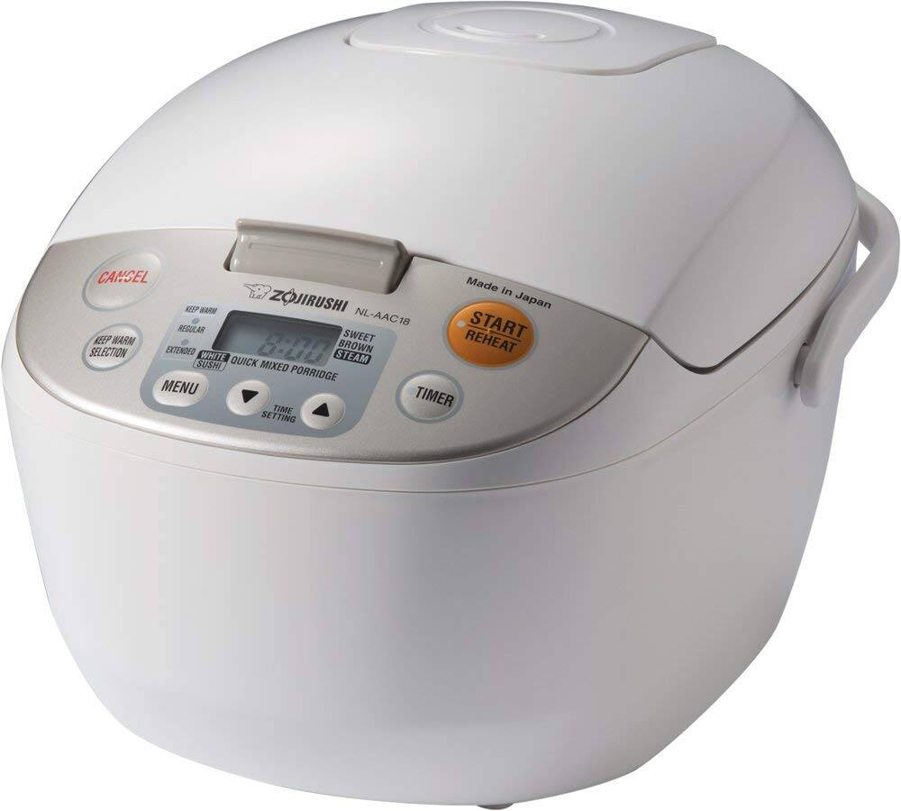 Made in Japan  
Zojirushi NL-AA18  
CANCEL  
KEEP WARM  
REGULAR  
EXTENDED  
WHITE  
QUICK  
SWEET  
BROWN  
STEAM  
SUSHI  
MIXED PORRIDGE  
MENU  
TIMER  
TIME SETTING  
START REHEAT