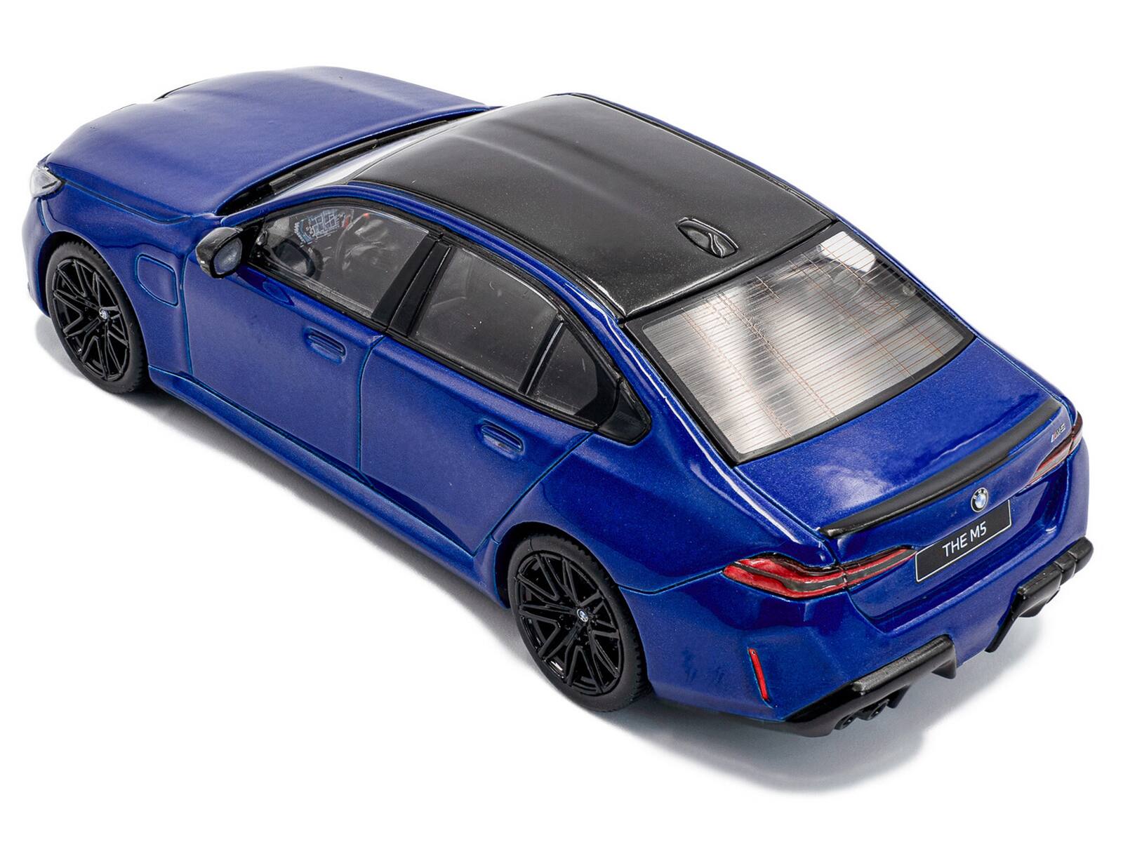 Alt View 6. Solido - 2024 BMW M5 Sedan Marina Bay Blue Metallic with Black Top 1/43 Diecast Model Car by Solido.
