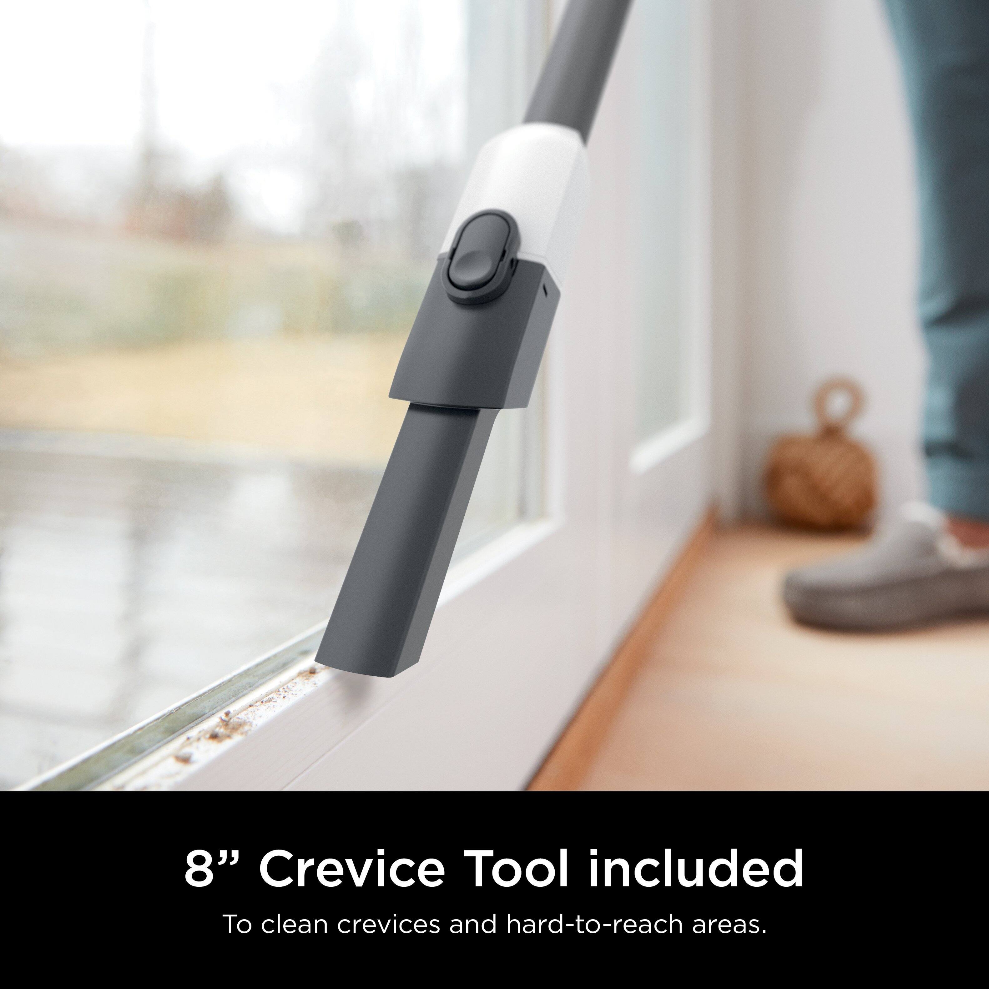 The text on the image reads: "8" Crevice Tool included To clean crevices and hard-to-reach areas."