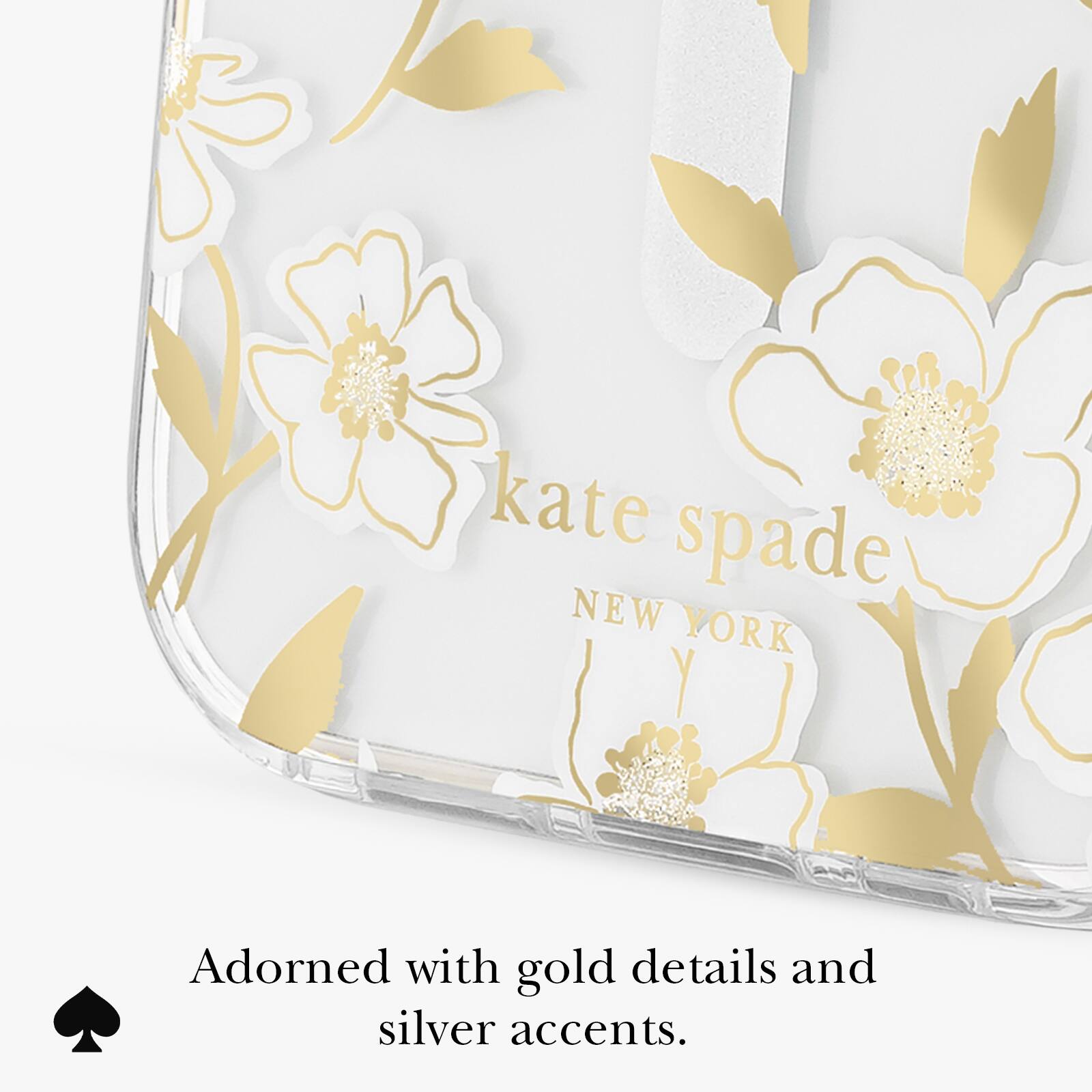 kate spade NEW YORK

Adorned with gold details and silver accents.