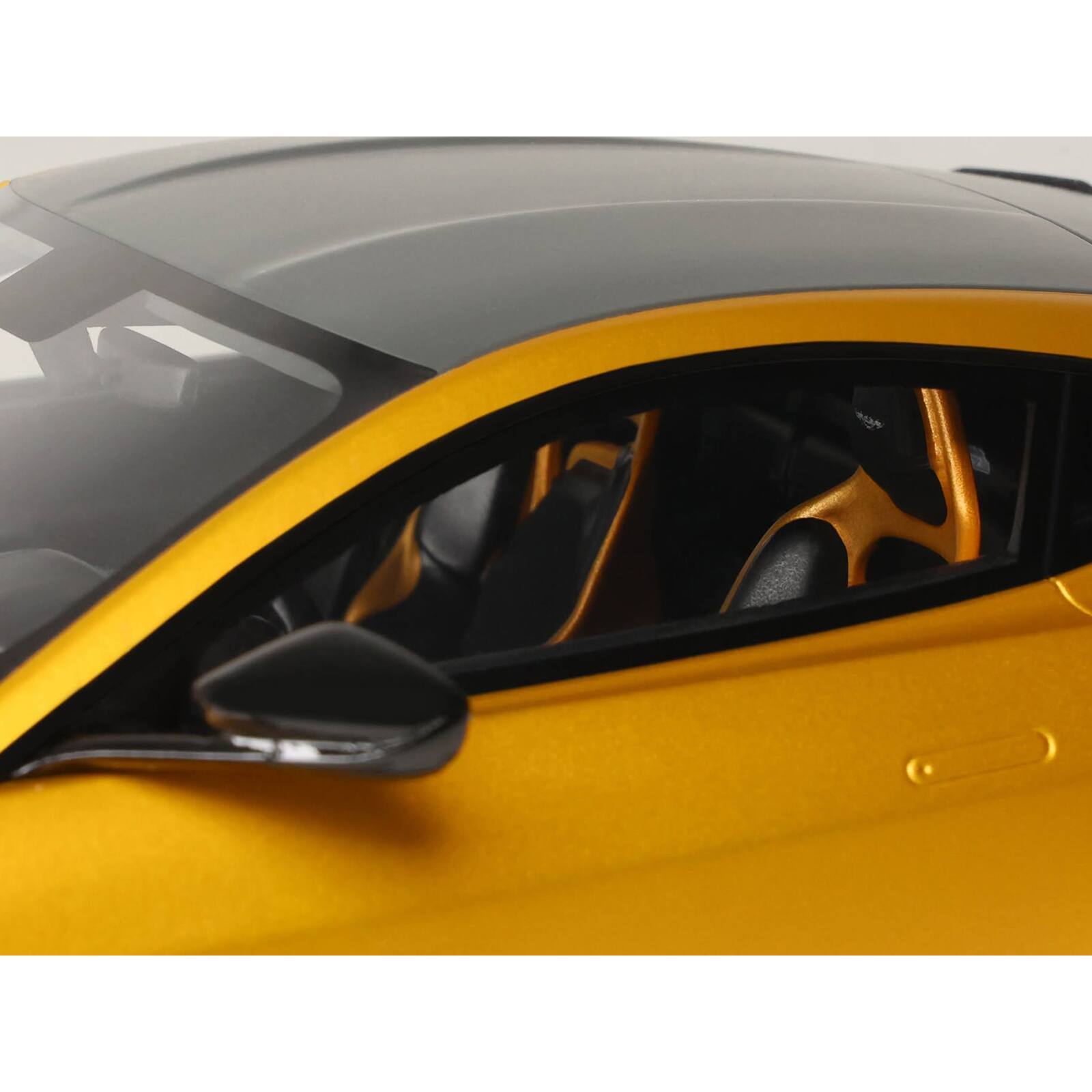 Alt View 1. GT Spirit - 2024 Aston Martin Valiant Auric Gold Metallic with Black Top 1/18 Model Car by GT Spirit.