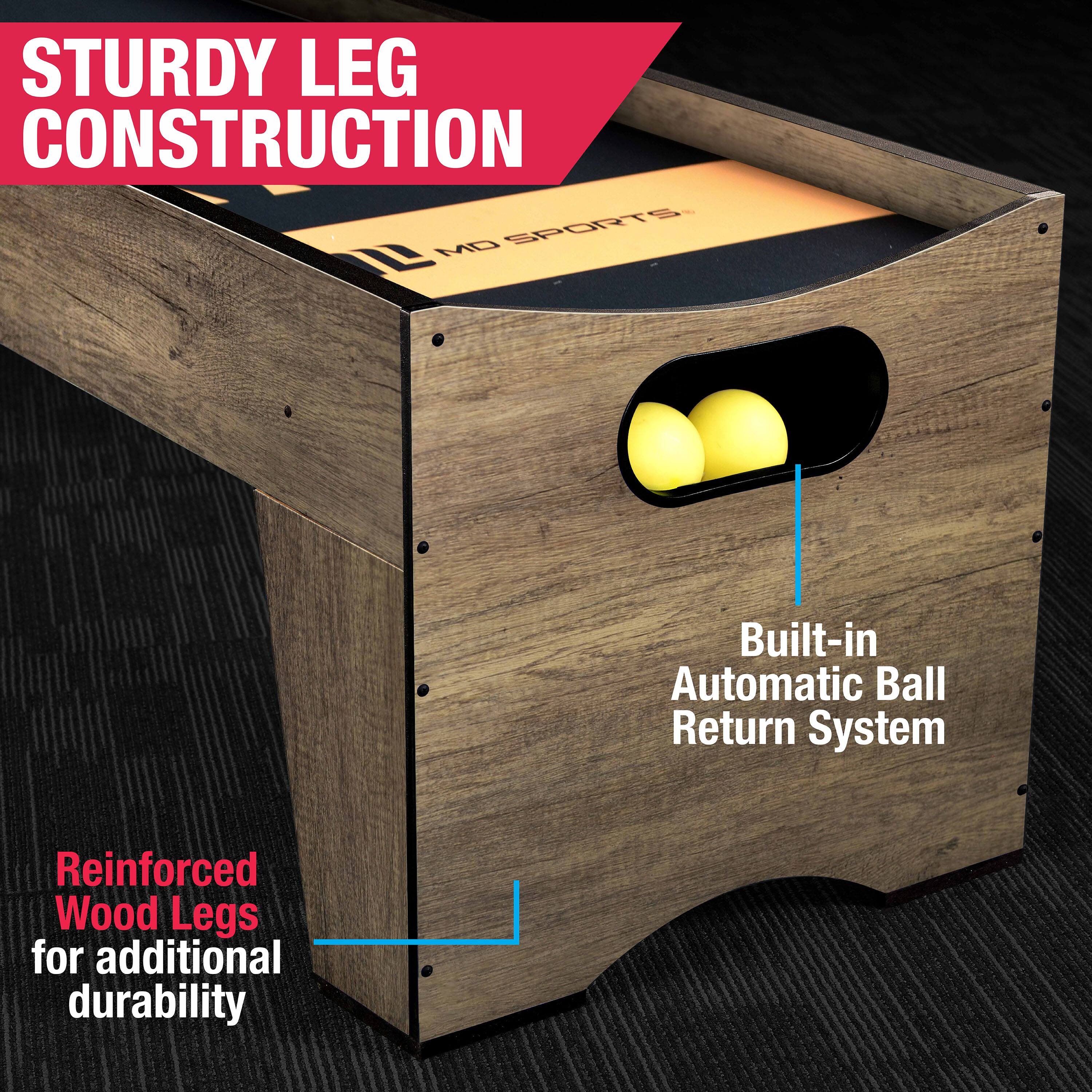 The text on the image reads: "Sturdy Leg Construction Built-in Automatic Ball Return System Reinforced Wood Legs for additional durability."