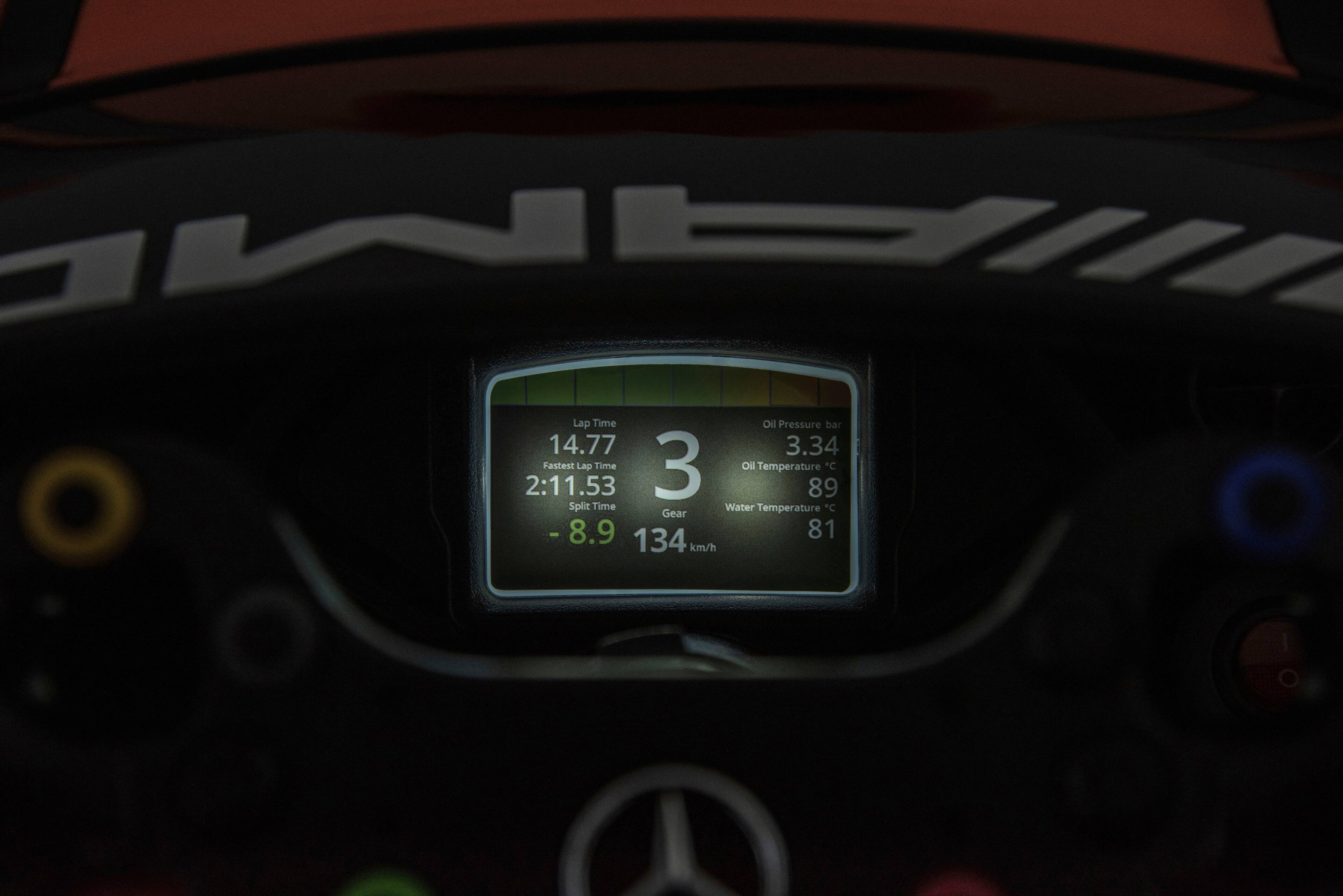 The text on the image reads:

Lap Time: 2:11.53
Oil Temperature: C
Water Temperature: C
Gear: -
Oil Pressure: 8.9 bar
Oil Temperature: 89°C
Split Time: 14.77

The corrected text would be:

Lap Time: 2:11.53
Oil Temperature: C
Water Temperature: C
Gear: -
Oil Pressure: 8.9 bar
Oil Temperature: 89°C
Split Time: 14.77