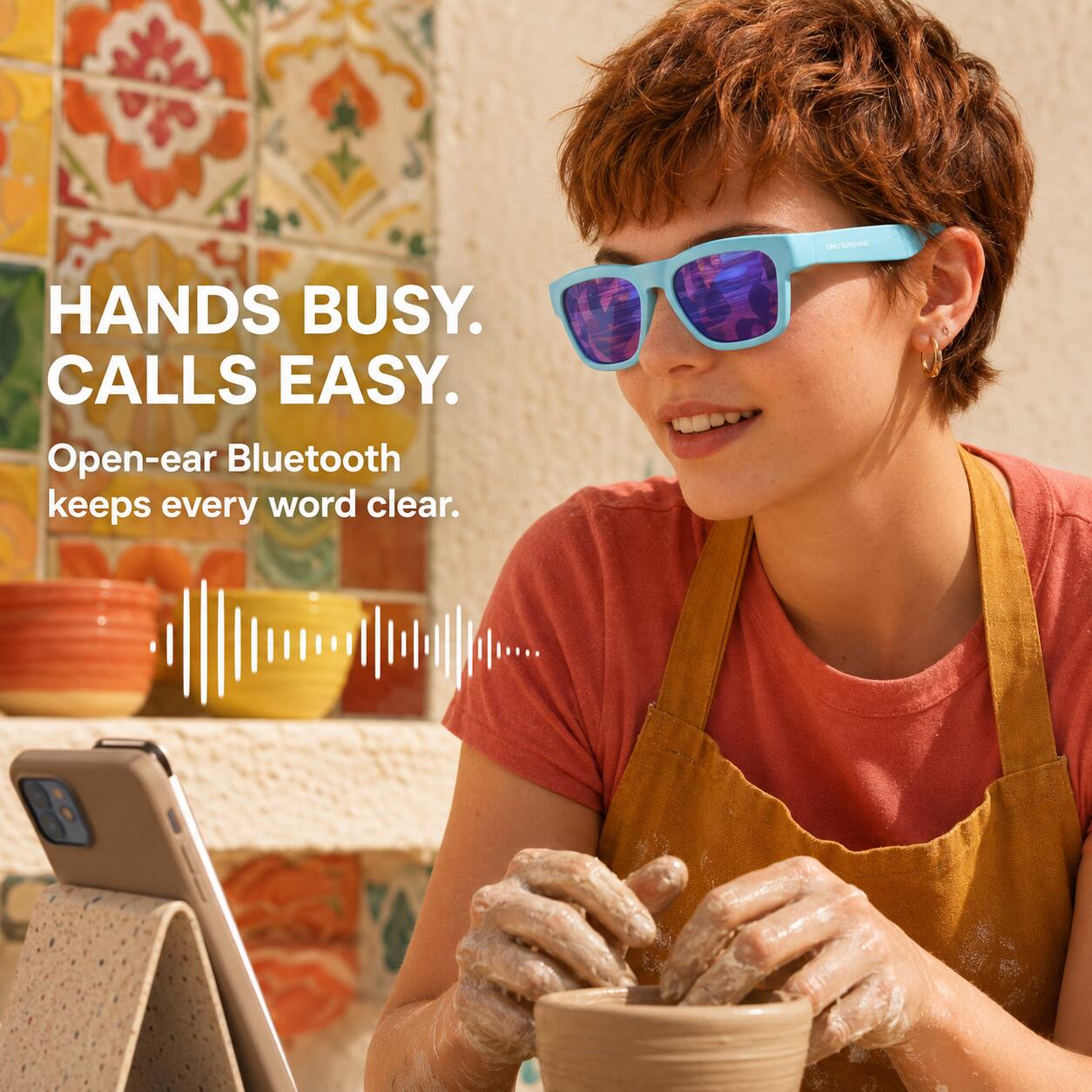 HANDS BUSY. CALLS EASY.  
Open-ear Bluetooth keeps every word clear.