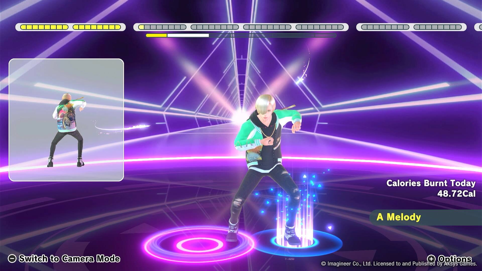 The text on the image reads: "Calories Burnt Today 48.72Cal A Melody Switch to Camera Mode + Options Imagineer Co., Ltd. Licensed to and Published by Aksys Games."