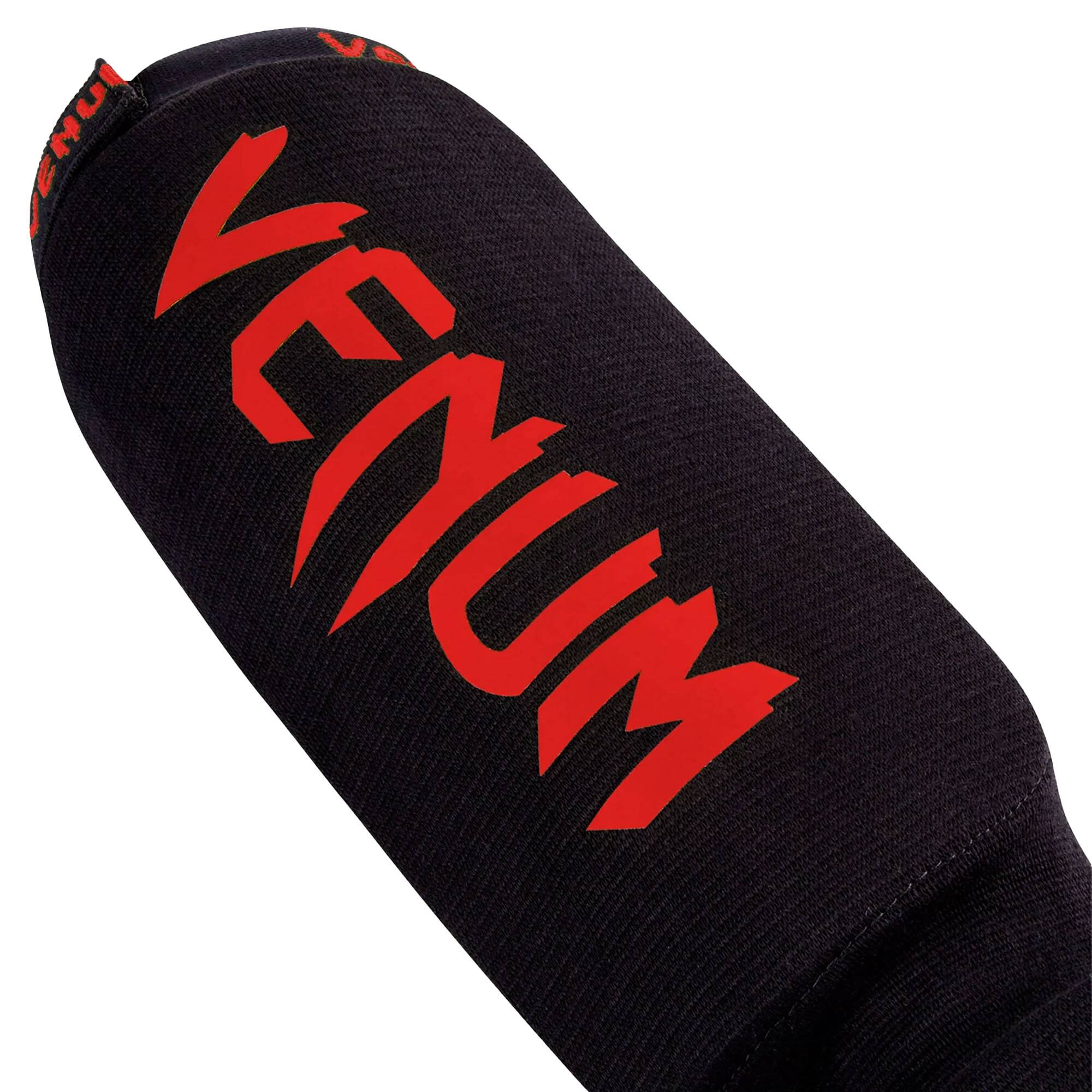 Alt View 3. Venum - Venum Kontact Slip-On Shin And Instep Guards, Black/Red, Medium - Black/Red M.