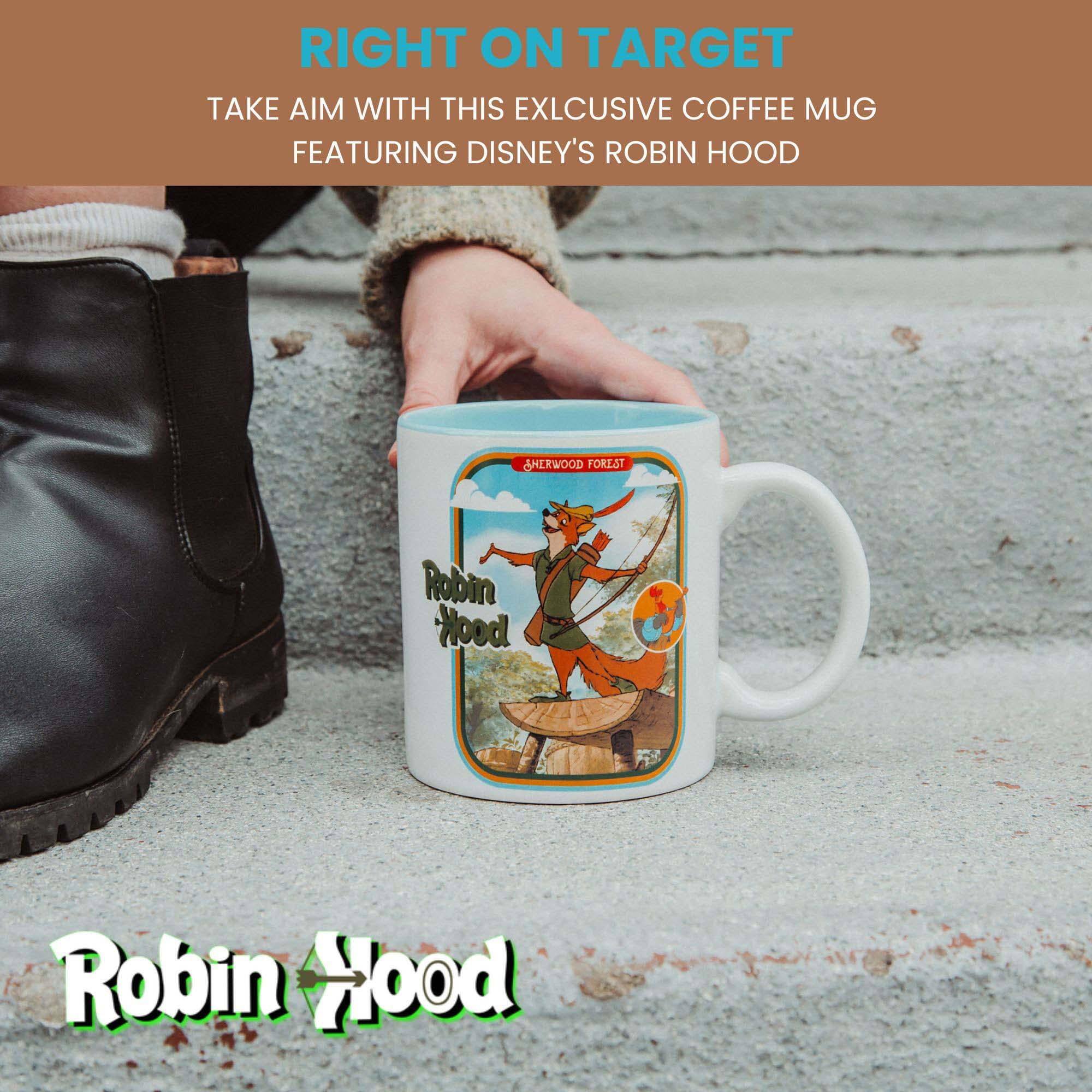 RIGHT ON TARGET  
TAKE AIM WITH THIS EXCLUSIVE COFFEE MUG FEATURING DISNEY'S ROBIN HOOD  

Robin Hood