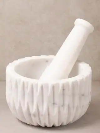 Front. GAURI KOHLI - Russell Mortar and Pestle - Shades of white.