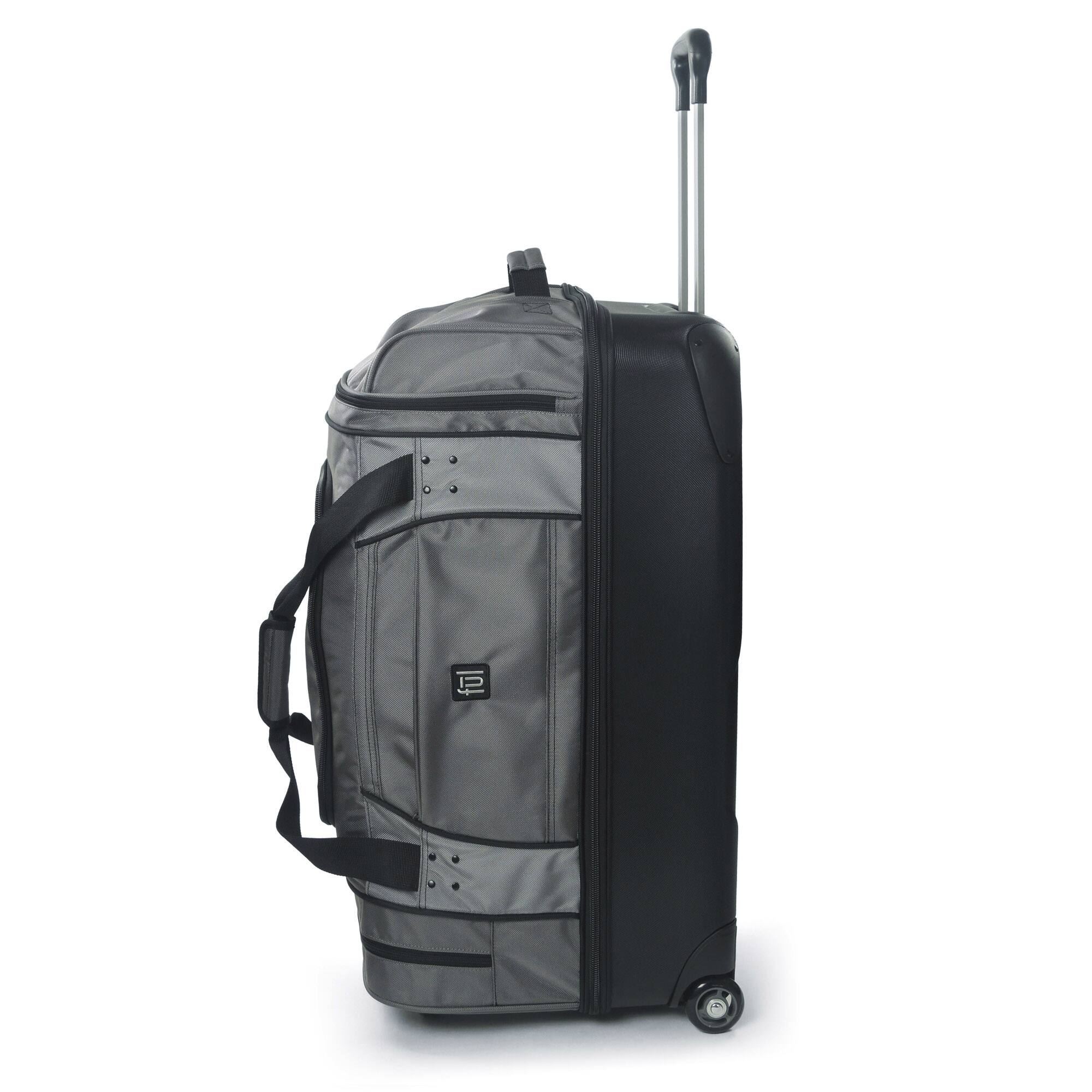 Angle. Ful - Workhorse 30in Rolling Duffel Bag, Retractable Pull Handle, Split Level Storage - BLACK.