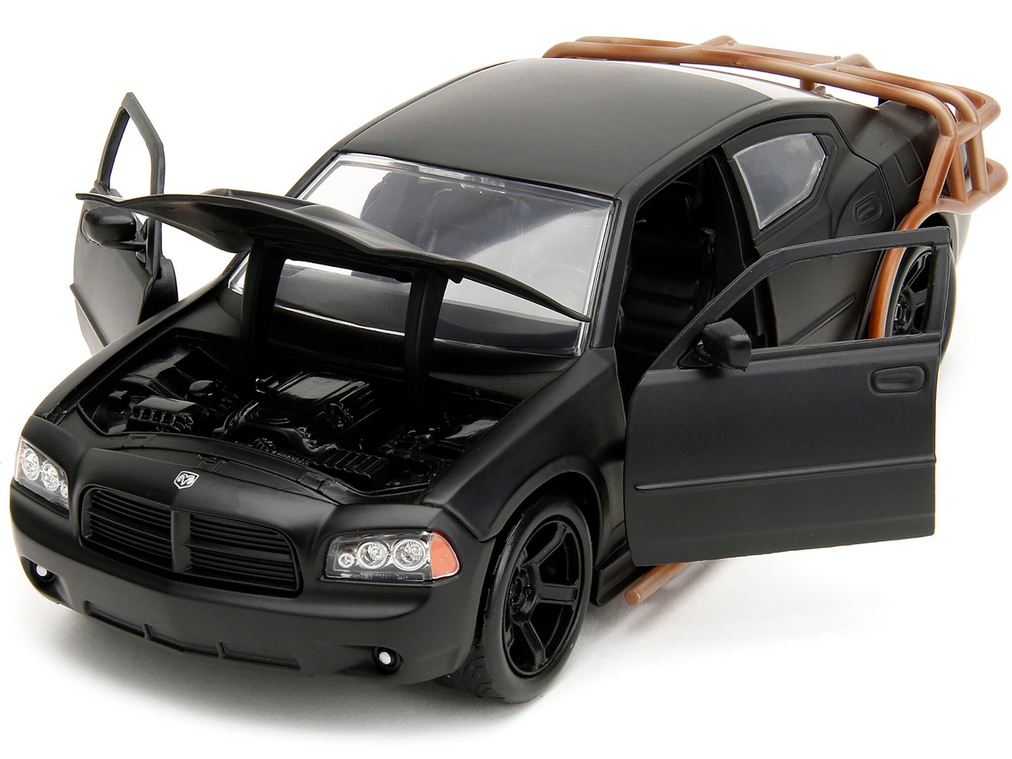 Angle. Jada - 2006 Dodge Charger Matt Black with Outer Cage "Fast & Furious" Movie 1/24 Diecast Model Car by Jada - Matt Black.