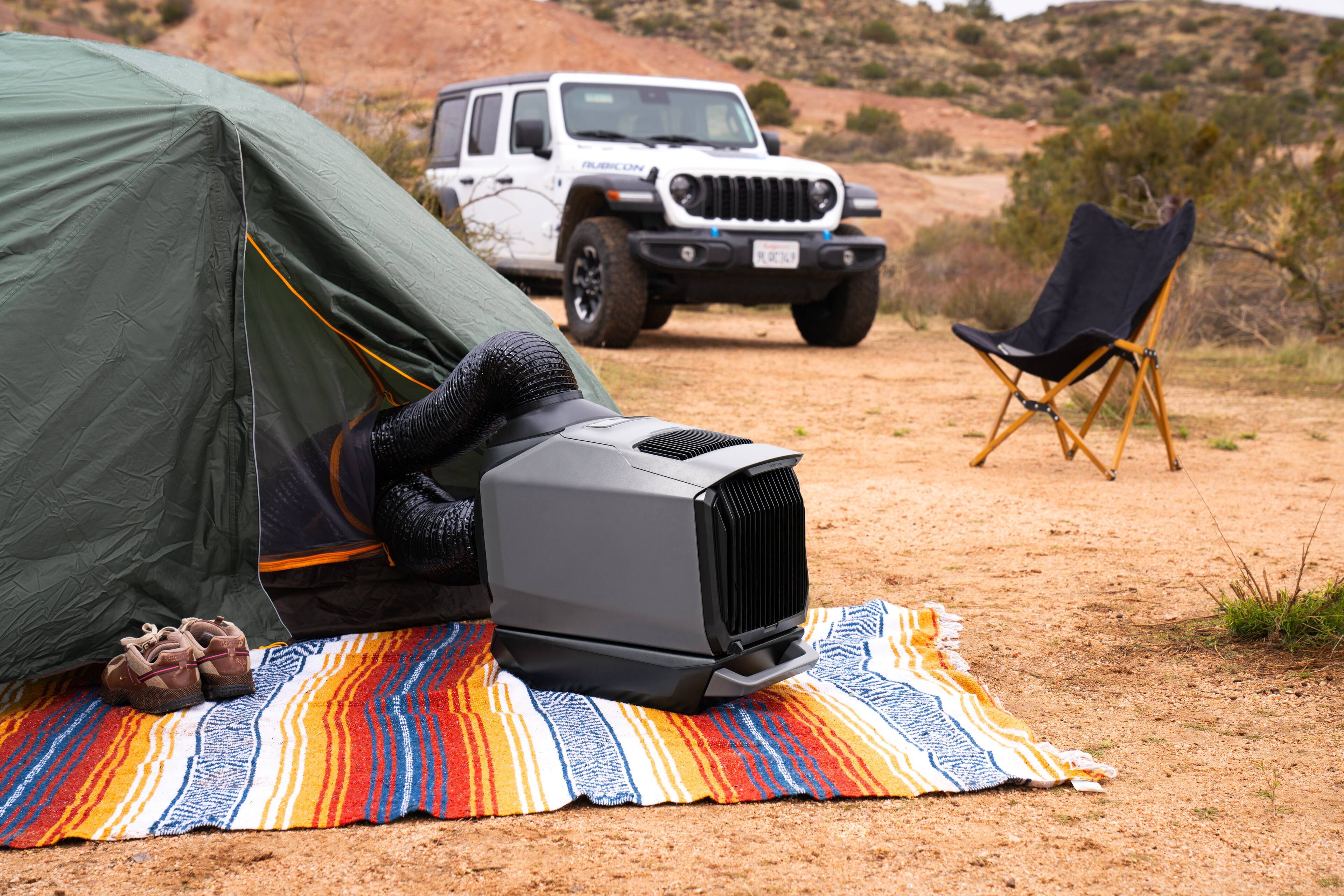 Jeep Rubicon is parked in the dirt.