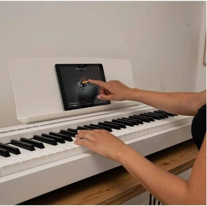 Left. Kawai Pianos - ES120 88-Key Portable Digital Piano with Responsive Hammer Compact Action | Built-in Speaker System with Bluetooth MIDI - Light Gray.