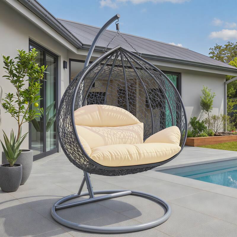 Left. LeisureMod - LeisureMod Recluse Grey Wicker Hanging Egg Chair with Stand, Modern Indoor Outdoor Patio Swing, 440lb Capacity - Cream.