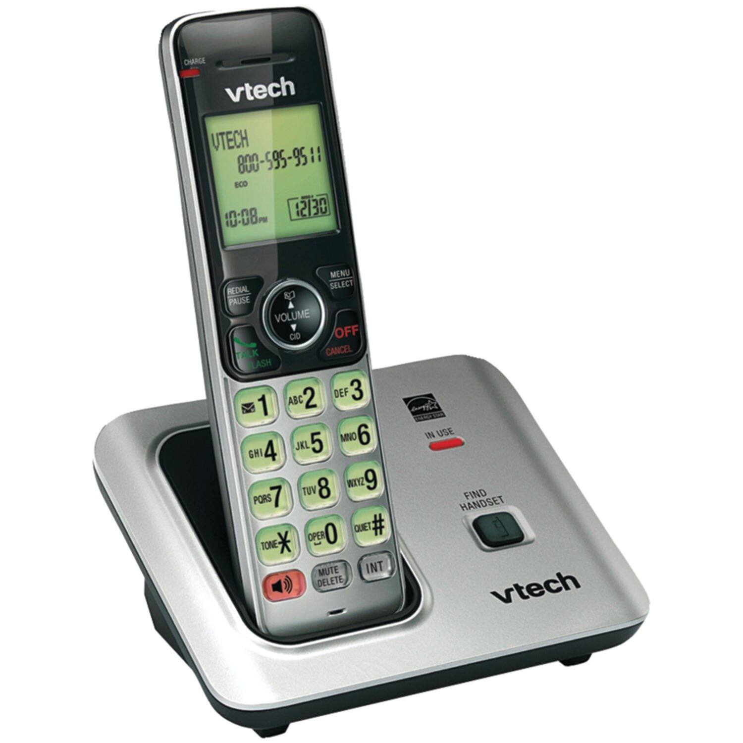 CHARGE  
vtech  
UTECH  
800-595-9511  
10:08 PM  
12/30  
MENU SELECT  
REDIAL  
PAUSE  
VOLUME  
OFF  
TALK  
CANCEL  
FLASH  
ABC 2 DEF 3  
1 JKL 5 MNO 6  
GHI 4 TUV 8  
WIYZ 9 PORS 7  
O QUET # *  
OPER TONE  
MUTE  
INT DELETE  
CTC IN USE  
FIND HANDSET  
vtech