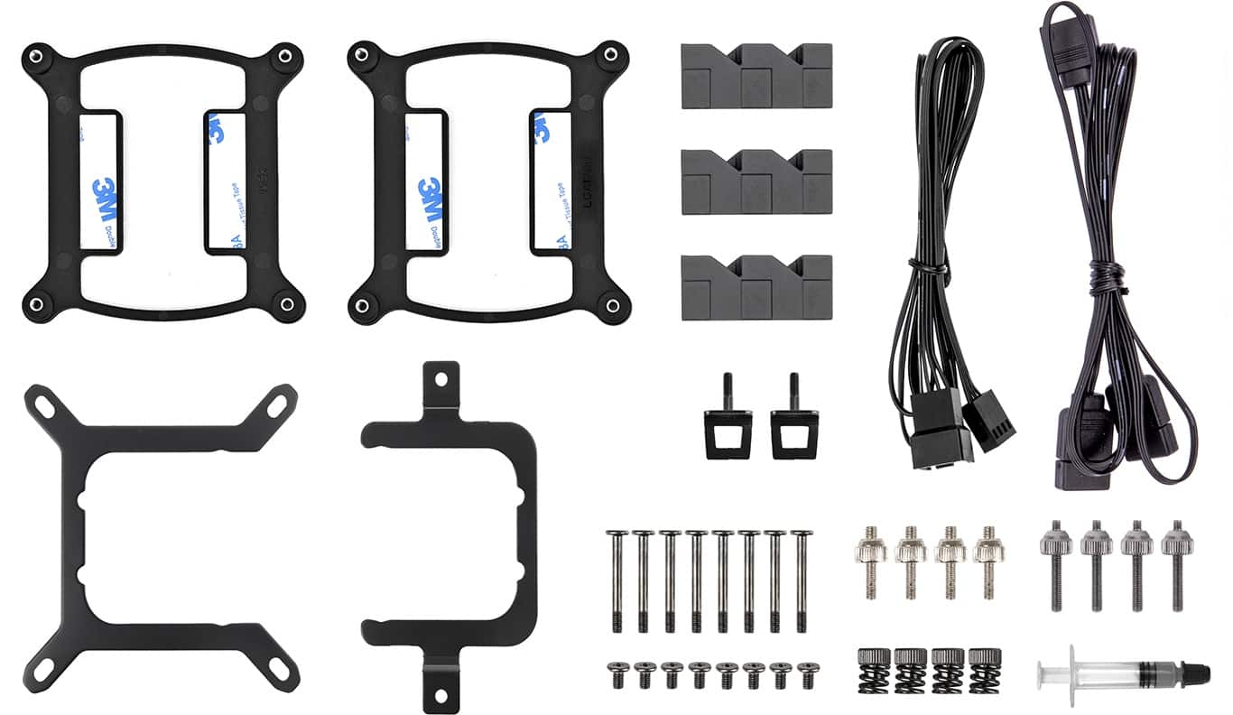 The image shows a collection of electronic components, including a power supply, wires, and a soldering iron. There are also two black plastic cases, one of which is a cell phone case. The components are arranged in an organized manner, with some of them placed on a table. The image also features a pair of scissors, which could be used for cutting wires or other materials.