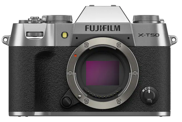The image features a FUJIFILM X-T50 digital camera with a large lens. The camera is silver and black in color, and it is positioned in a way that showcases the lens prominently. The lens is the main focus of the image, and it appears to be a high-quality piece of equipment.