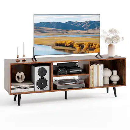 The text on the image reads: "The witch doesn't do it. The mrd does it. 40 LAW THE NATIONS W/ Houses LMtelier AM Melier I Houses | I I I 1 ENLIDOY | I | ! | ! P EMUK | ser m." This text is unrelated to the image of the entertainment center with a flat screen TV and various items.