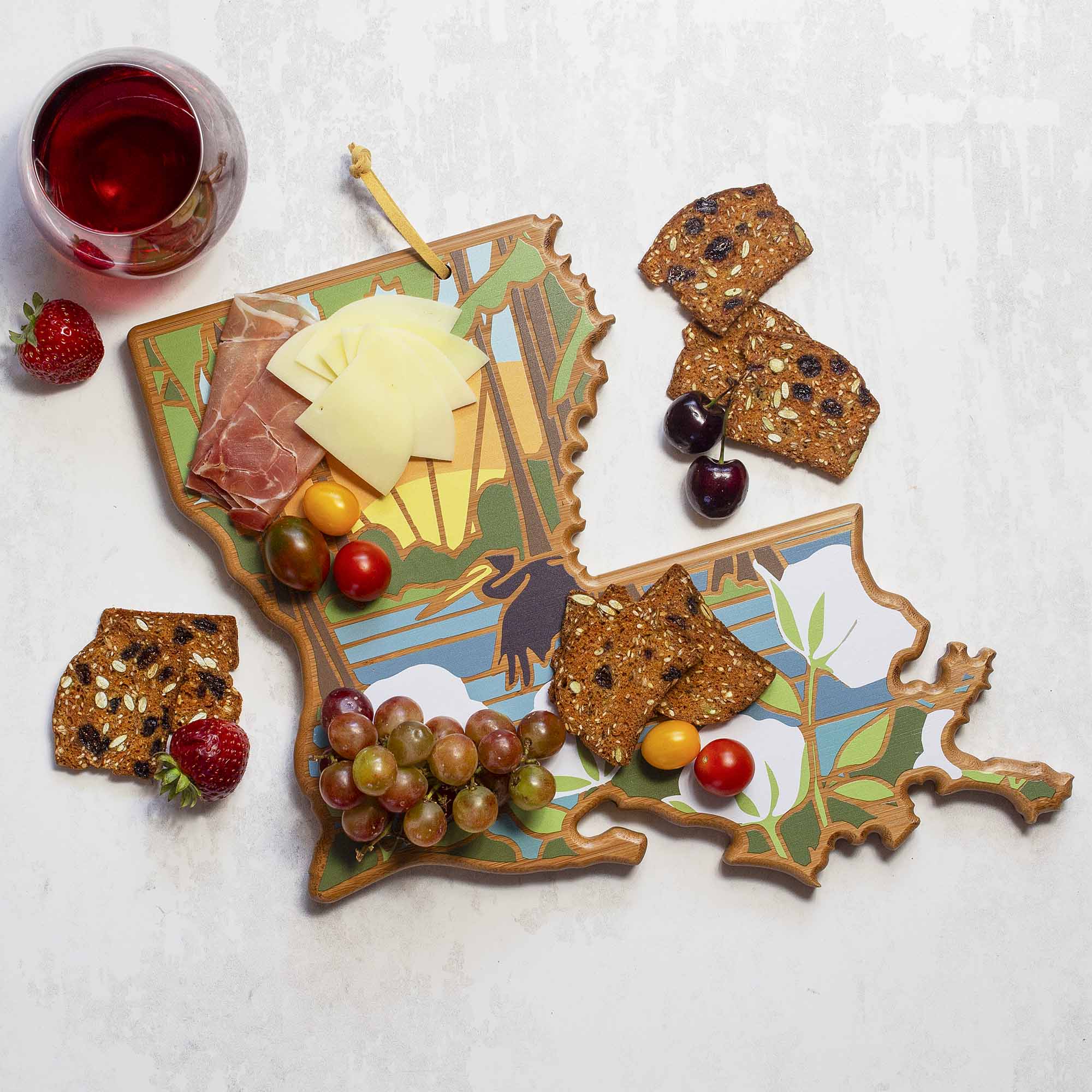 Angle. Totally Bamboo - Louisiana Cutting Board with Artwork by Summer Stokes.