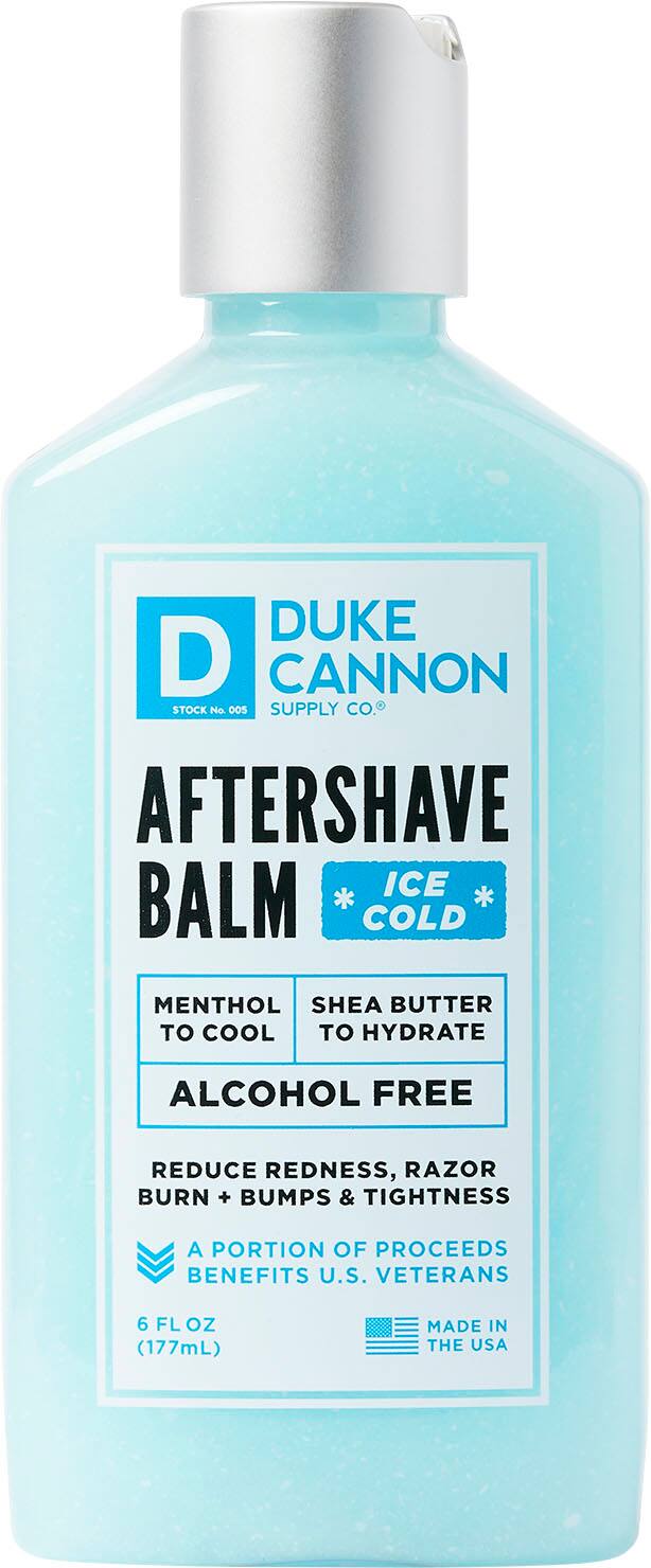 DUKE CANNON STOCK CO. AFTERSHAVE BALM * ICE * COLD MENTHOL SHEA BUTTER TO COOL * HYDRATE * ALCOHOL FREE * REDUCE REDNESS, RAZOR BURN + BUMPS & TIGHTNESS * A PORTION OF PROCEEDS BENEFITS U.S. VETERANS * 6 FL OZ (177mL) * MADE IN THE USA