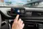 The text on the image reads:

"P $10,000 10 Siriusxm 02 SAION * A2 HITS D ill 11 Harry Styles As It Was xm Pop Fav Bank A  II  1 2 3 4 5 7 8 9 0 100 A MENU AUX 11:35 CAMERA N USB > K SBACK"

The text is a mix of various elements, such as a menu, a USB connection, and a camera. It seems to be describing a car's entertainment system or a navigation system. The text also contains a reference to Harry Styles and a SiriusXM radio station.