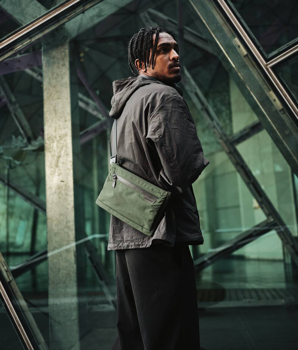 Alt View 4. ALPAKA - 2L Tech Organizer Sling Bag for iPad Mini, Zip Pouch Max V2 Crossbody Travel Bag with Expandable Storage - Green Axoflux 210D.
