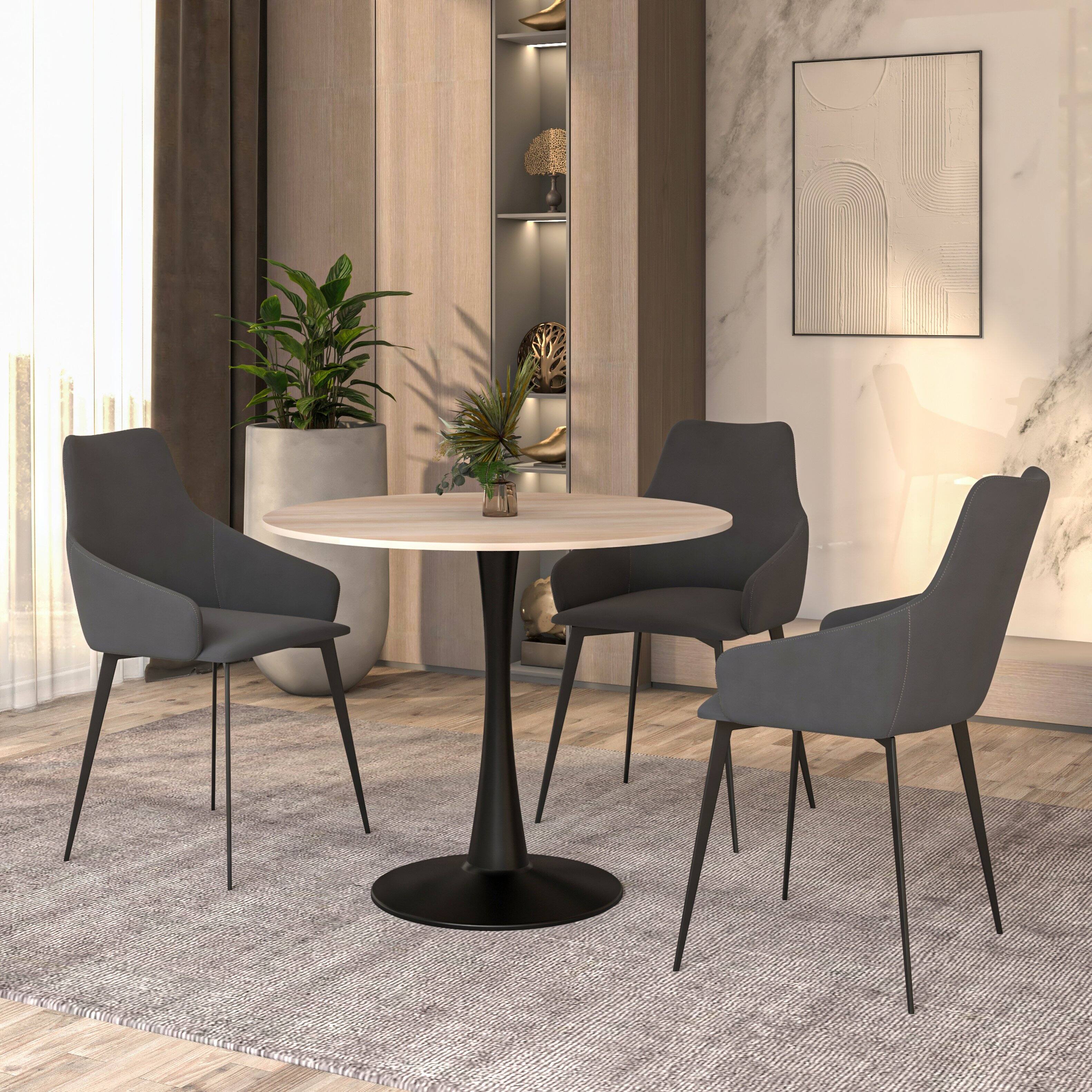 Angle. LeisureMod - LeisureMod Bristol 35 in. Round MDF Wood Dining Table in Stainless Steel Pedestal Base Modern Kitchen Table - Black/Natural Wood.