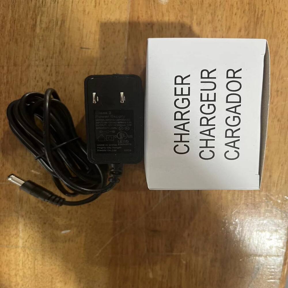 Class 2 Power Supply OUTPUT: US LISTED MADE IN CHINA E504979  
PingHu City HongKi Co., Ltd.  
0323