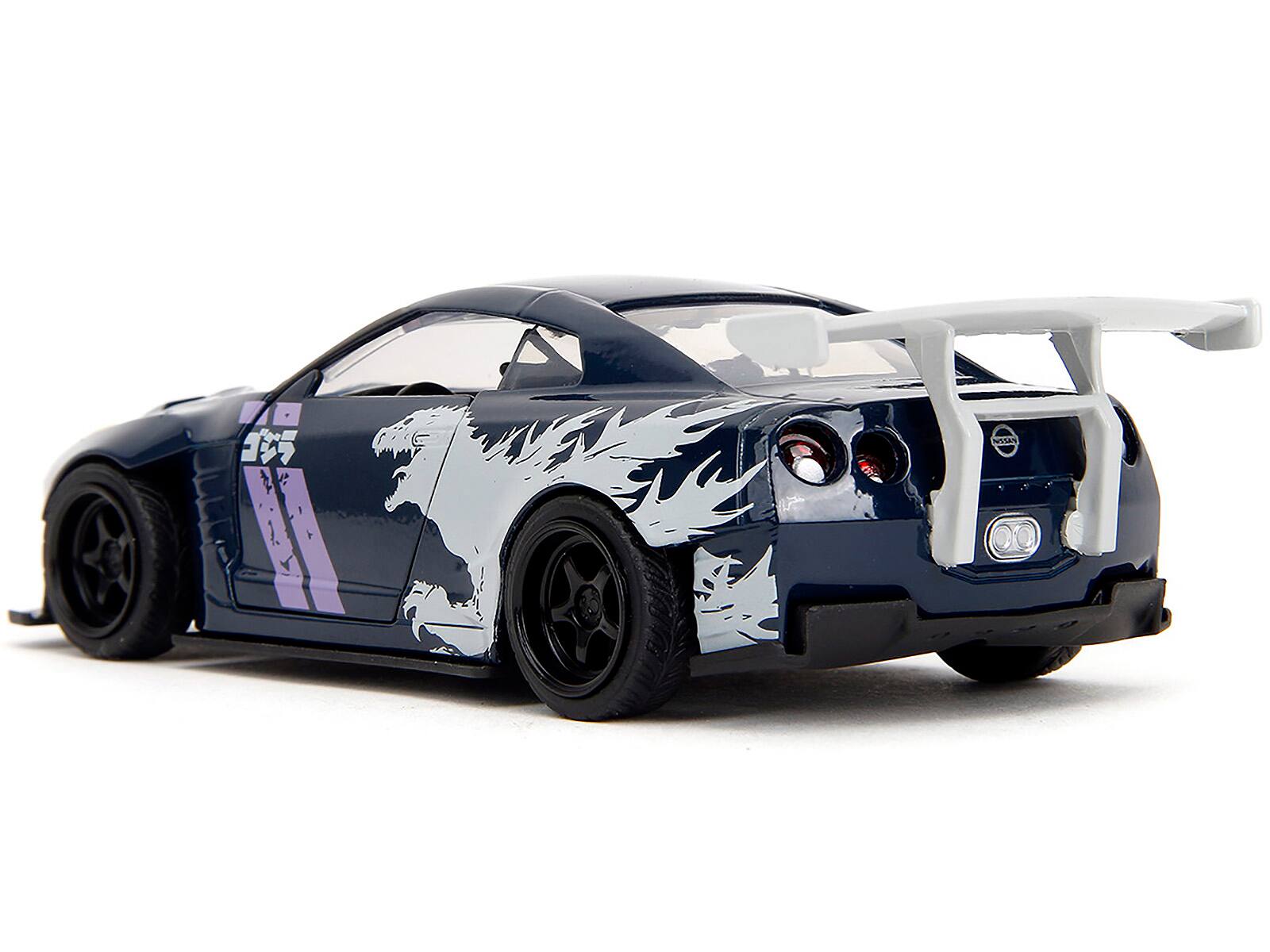 Alt View 1. Jada - 2009 Nissan GT-R (R35) Ben Sopra Dark Blue with Graphics "Godzilla" "Hollywood Rides" Series 1/32 - Dark Blue .