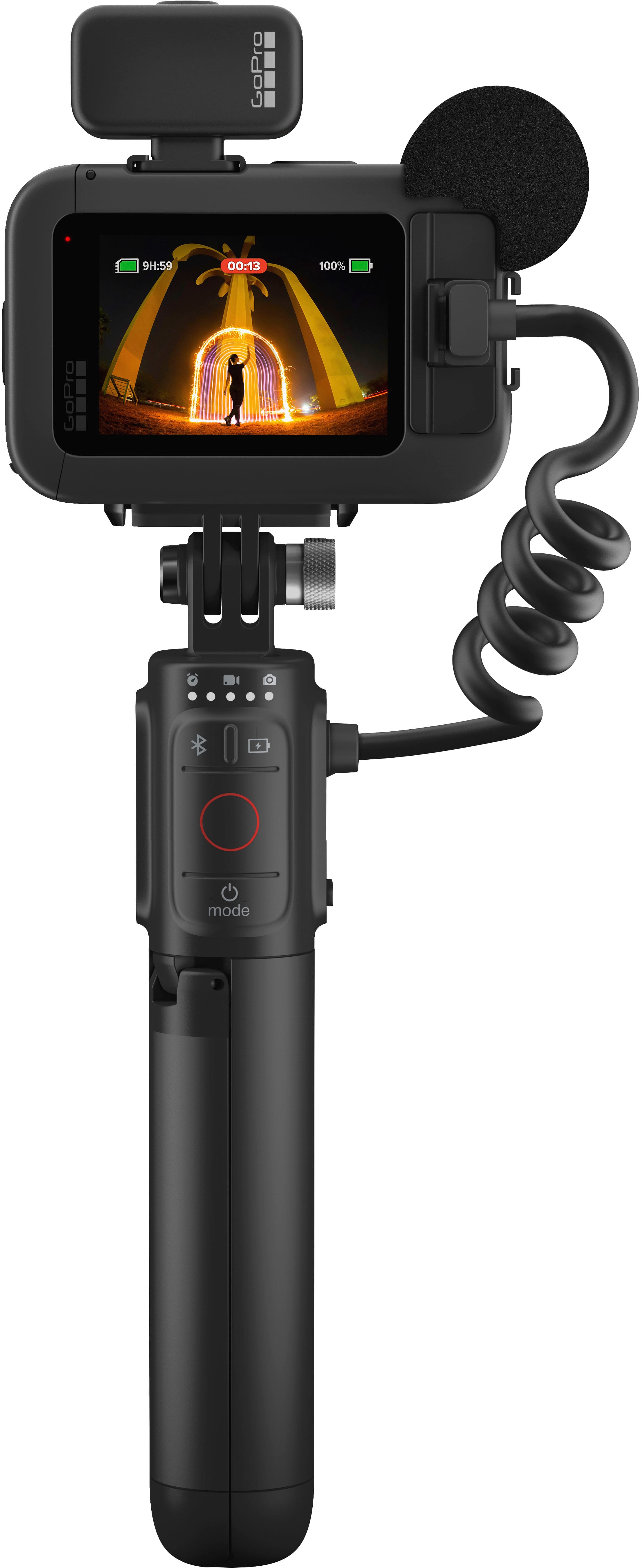 The image features a GoPro camera attached to a tripod, with the camera displaying a time of 9:59. The camera is set to 100% brightness and is in video mode.