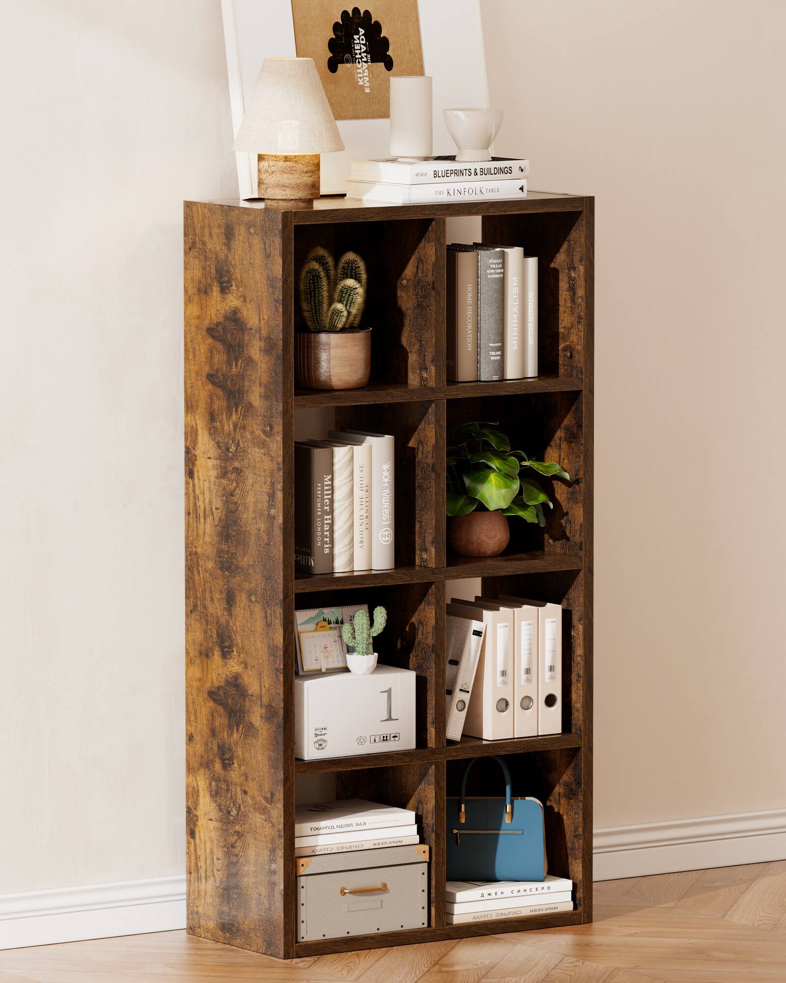 Sure, here is the corrected and grouped text from the image:

---

**Top Shelf:**
- BLUEPRINTS & BUILDINGS
- THE KINFOLK TABLE

**Second Shelf:**
- (Various books with visible titles: "MILLER Harris", "PI", "THIE", "1118Y HOME", "NuNEsSe")

**Third Shelf:**
- (Various books with visible titles: "MINIMALISM", "2 2 E")

**Fourth Shelf:**
- (Various books with visible titles: "O", "N", "ROAS", "E")

**Fifth Shelf:**
- (Various books with visible titles: "SIP", "ERSEUO")

**Bottom Shelf:**
- (Various books with visible titles: "AKEN CHNCEPO", "AKAKI 333333333333333333333333333333333333333333333333333333333333333333333333333333333