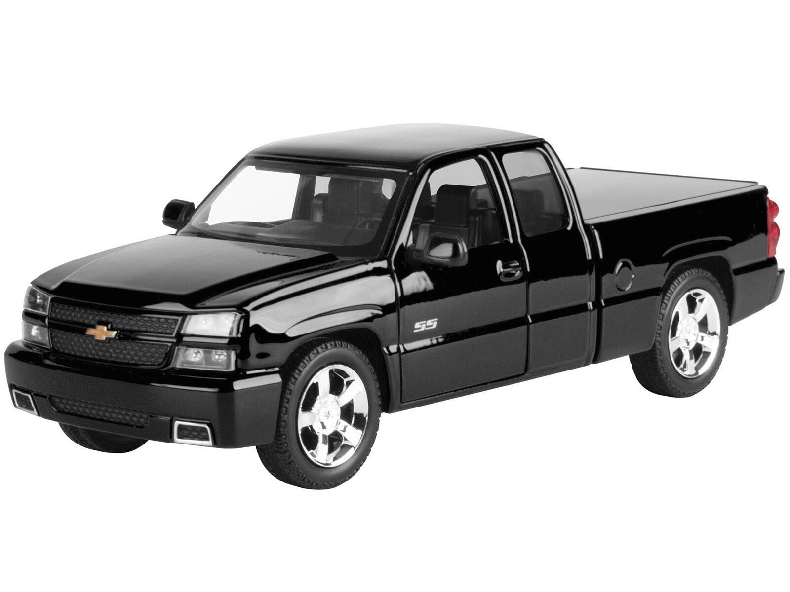 Angle. Motormax - 2006 Chevrolet Silverado SS Pickup Truck Black "Timeless Legends" Series 1/25 Diecast Model Car by Motormax - Black.