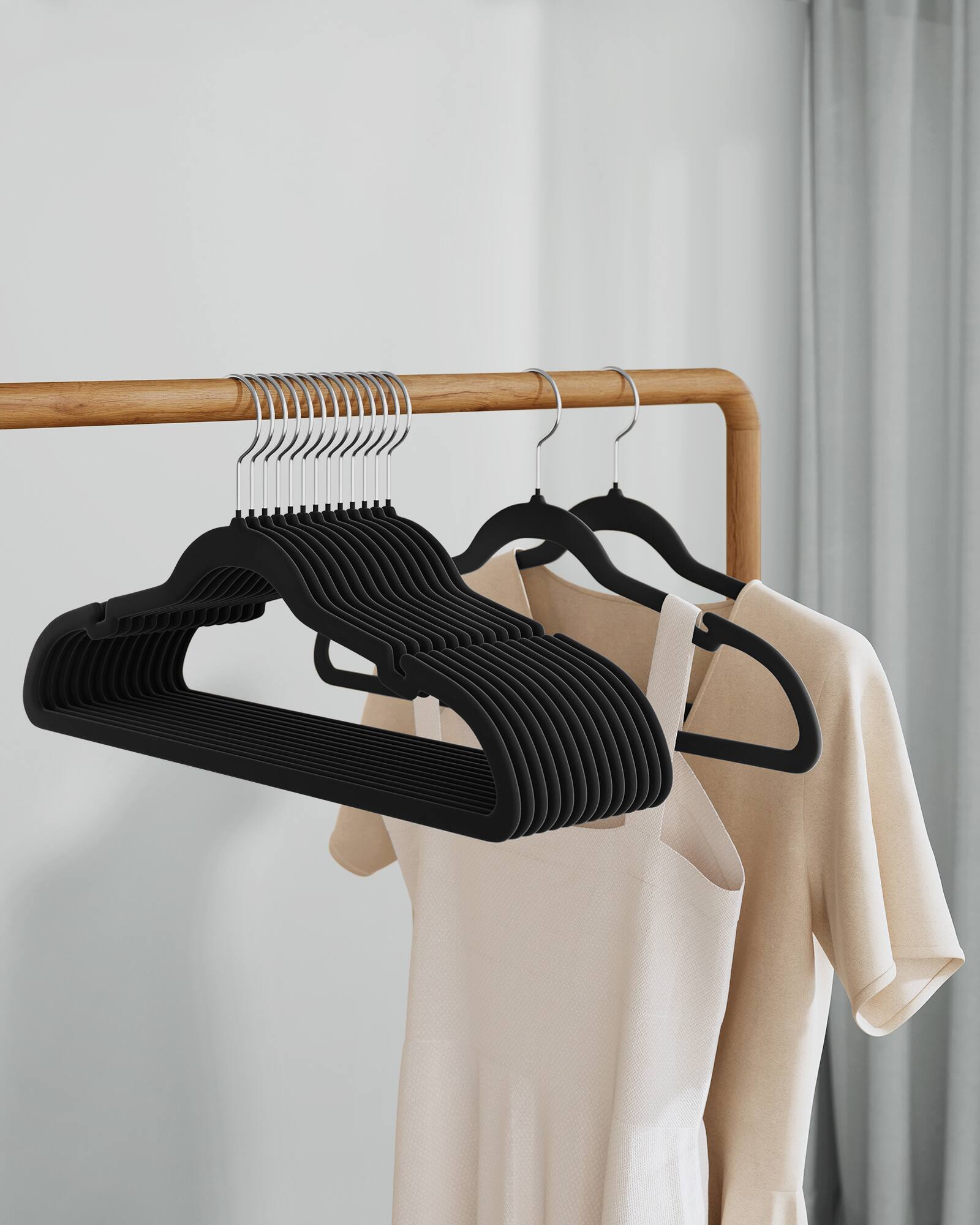 Alt View 4. Songmics Home - Velvet Hangers 60 Pack, Non-Slip Clothes Hangers, Suit Hangers with Shoulder Notches, Pants Bar, 360° Swivel Hook - Ink Black.