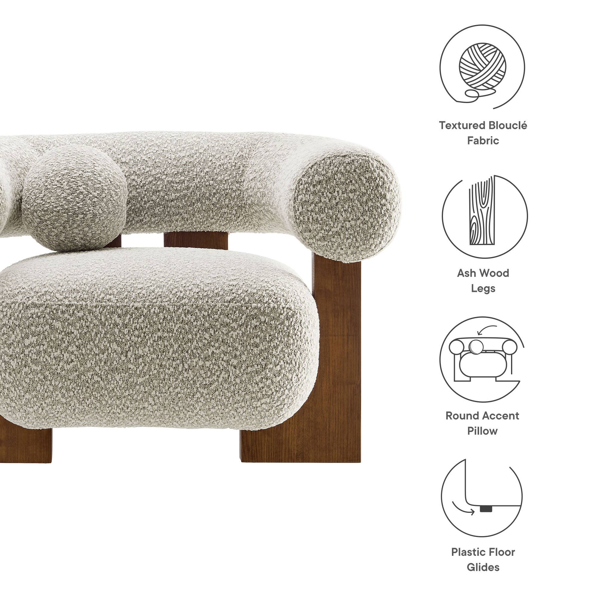 - Textured Bouclé Fabric
- Ash Wood Legs
- Round Accent Pillow
- Plastic Floor Glides